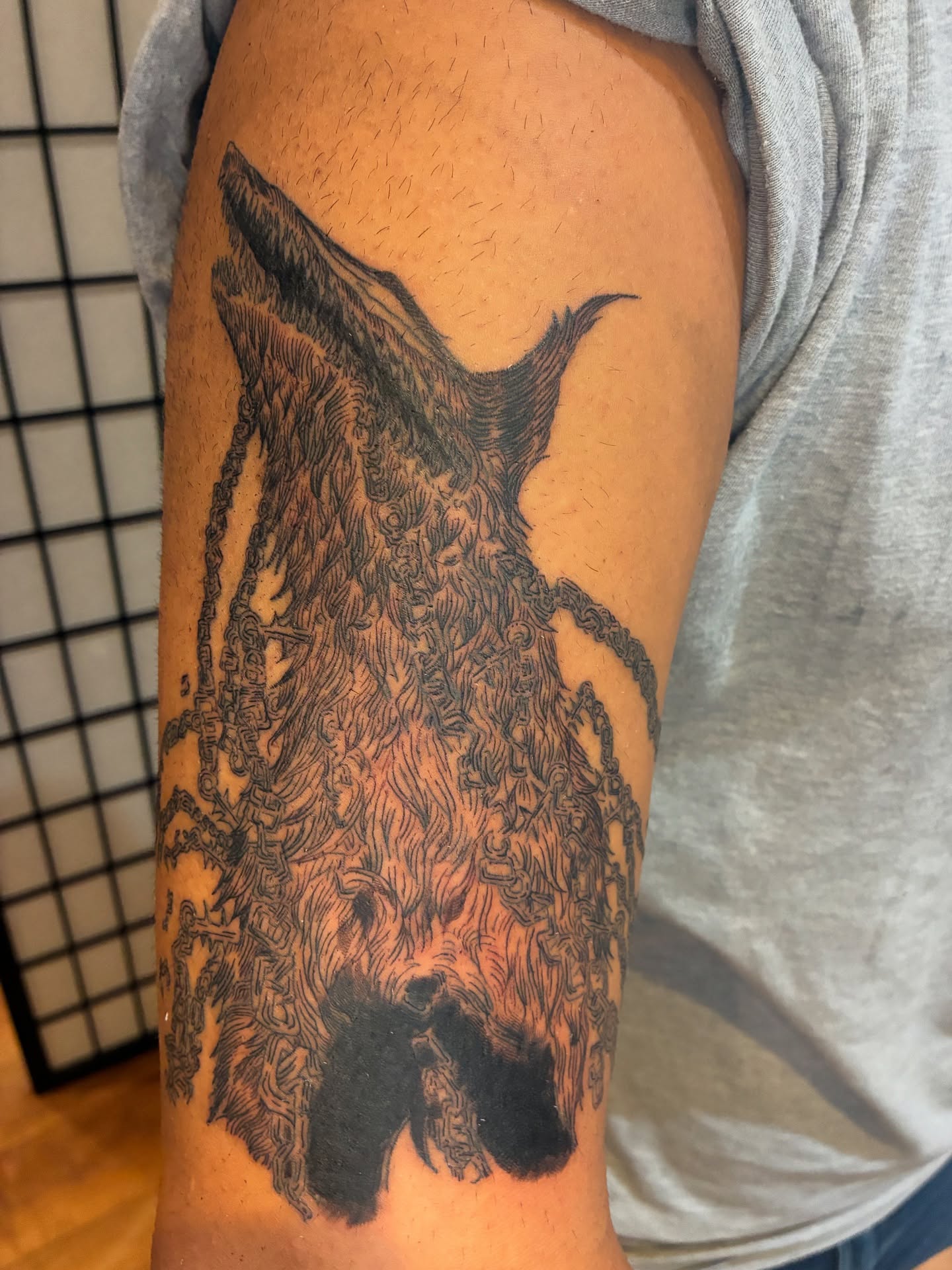 Wolf black and grey tattoo on the forearm by Steph Liebetreu