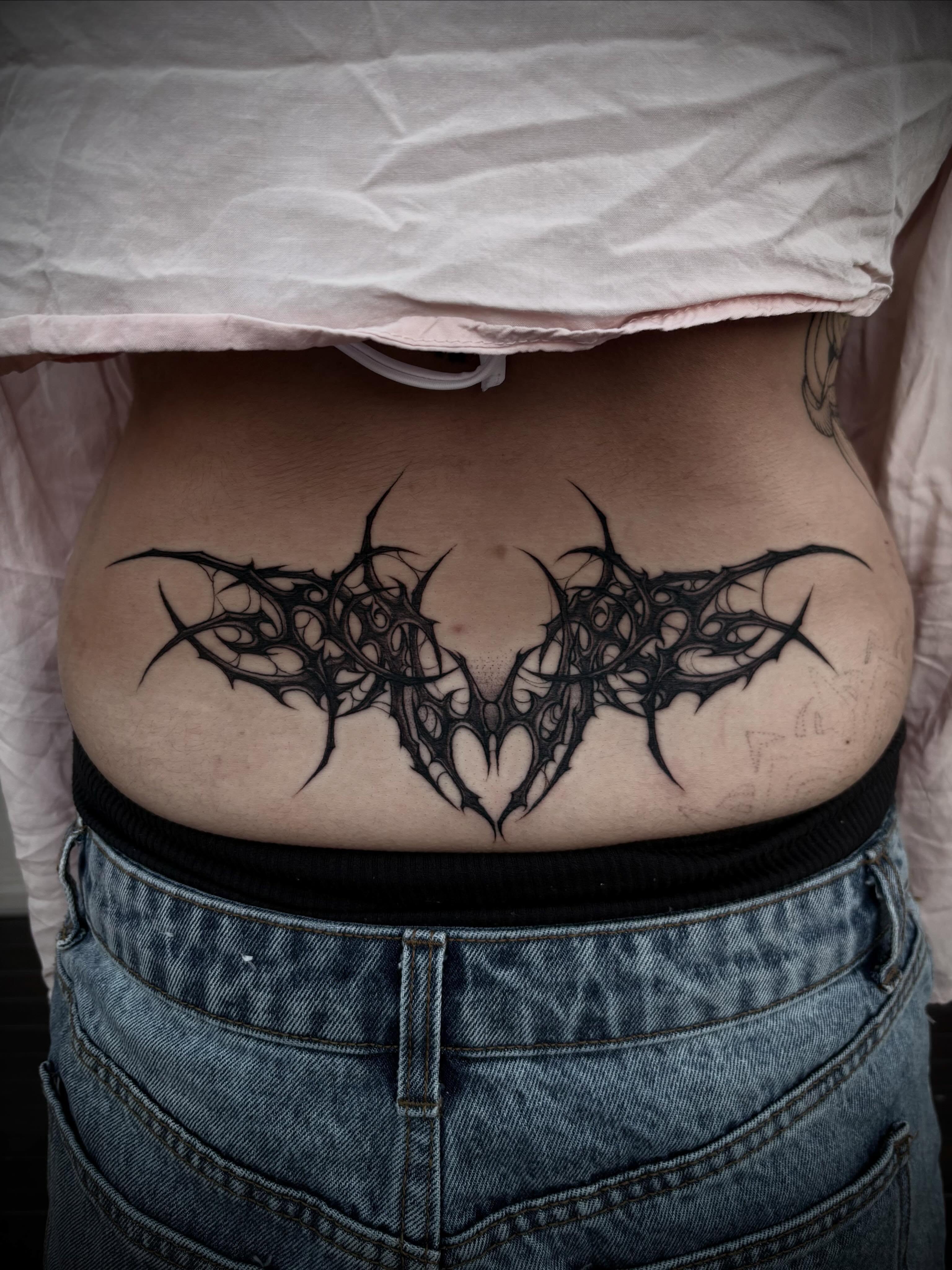 Bat tribal tattoo on the ribs by ๐ท๐๐๐๐