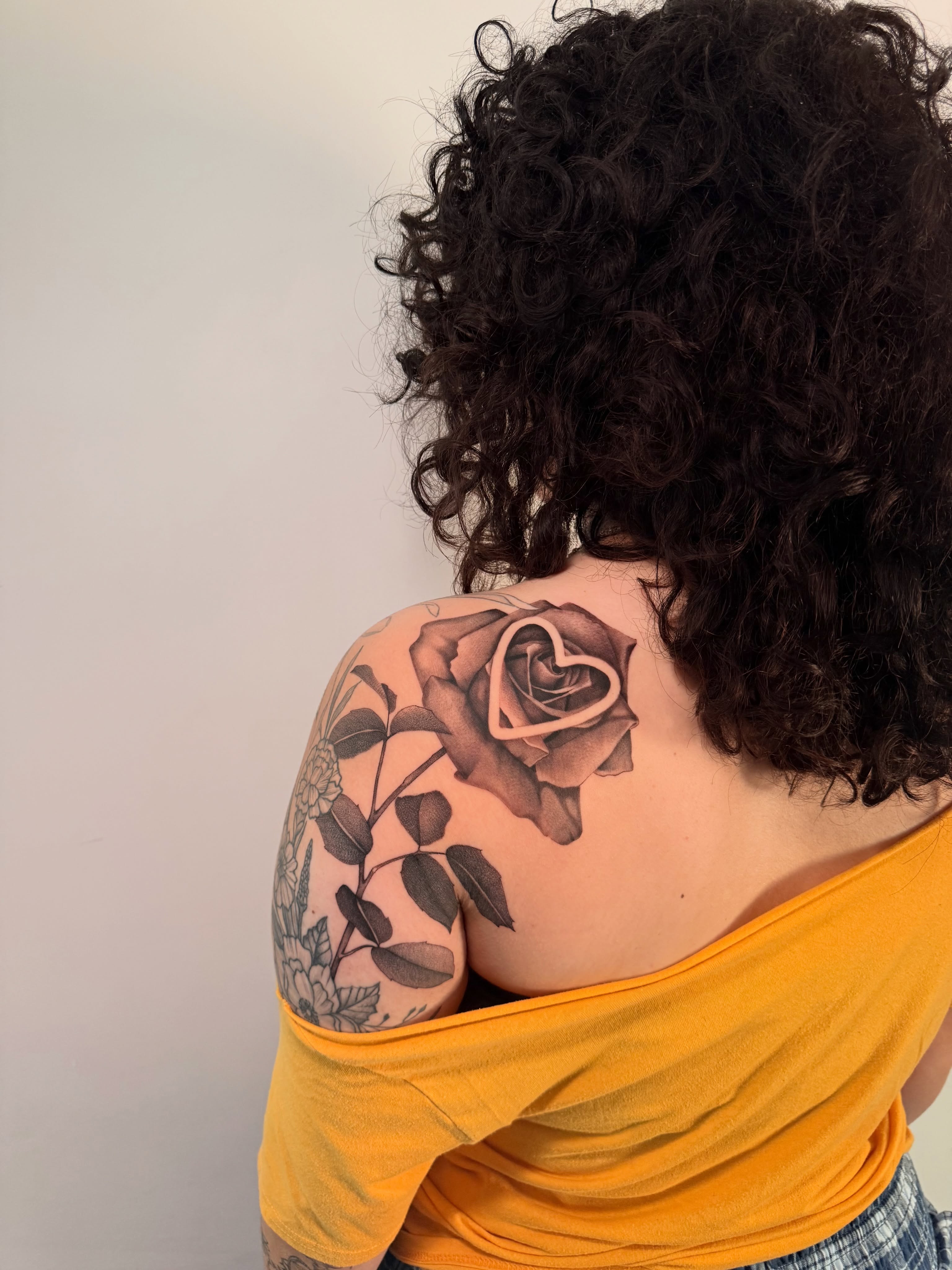 Rose with heart black and grey tattoo on the shoulder by 𝘋𝘪𝘢𝘯𝘯𝘢