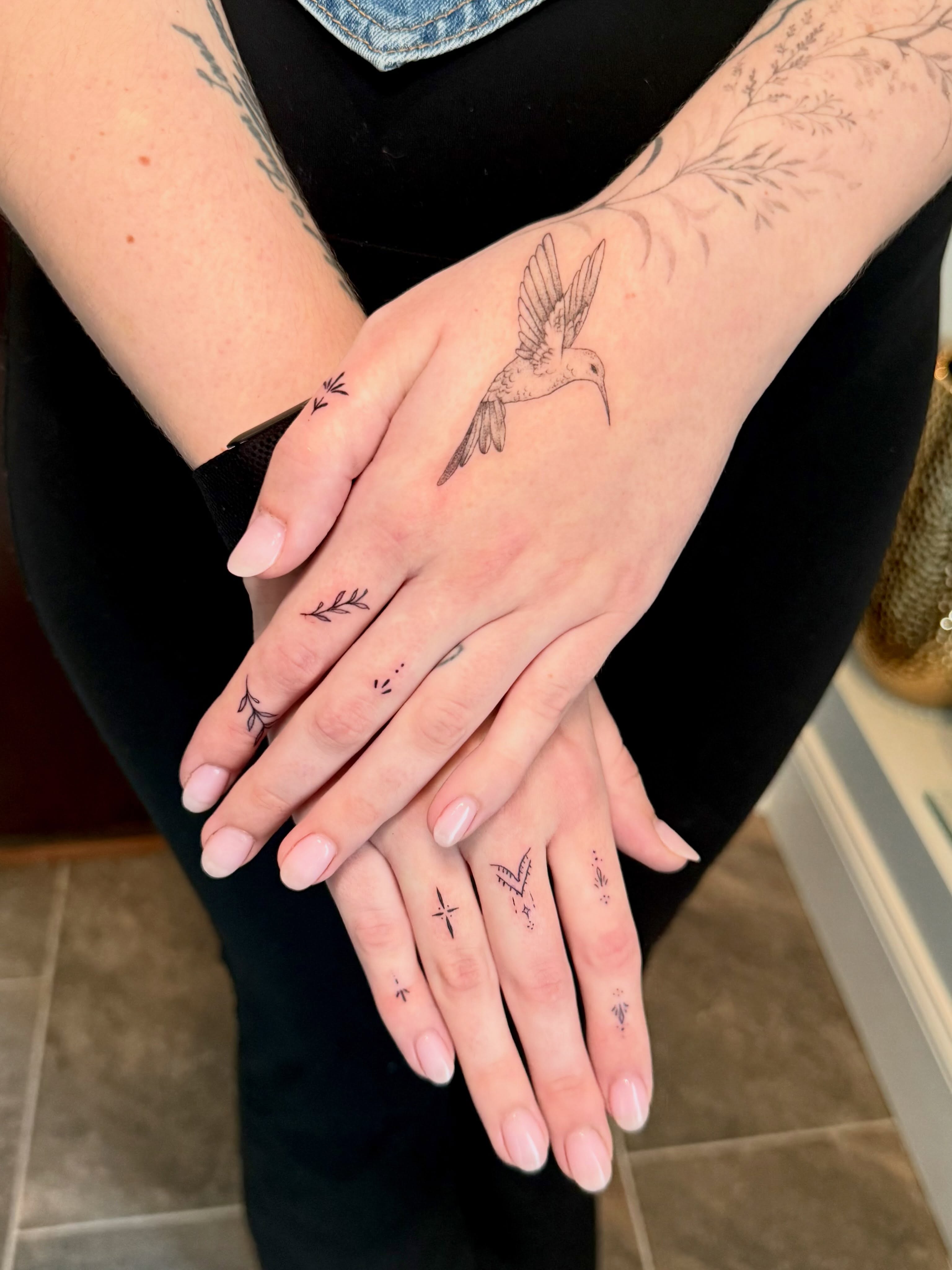 Hummingbird dotwork tattoo on the hand by Ana Blatt