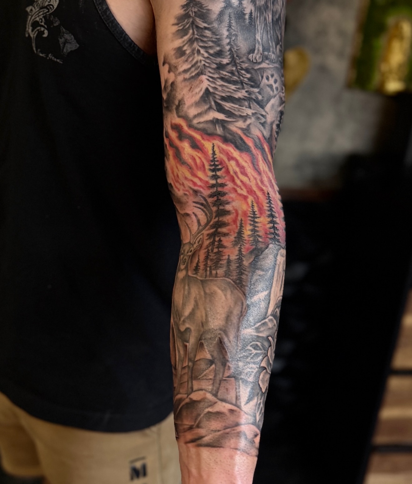 Forest fire realism tattoo on the forearm by Rikky Bobby, Mesa, Arizona