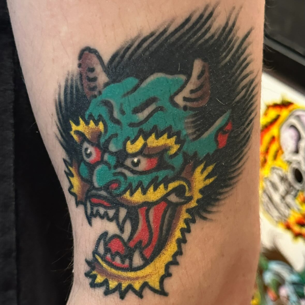 Dragon head American traditional tattoo on the forearm by Jared Allen, Saint Petersburg, Florida