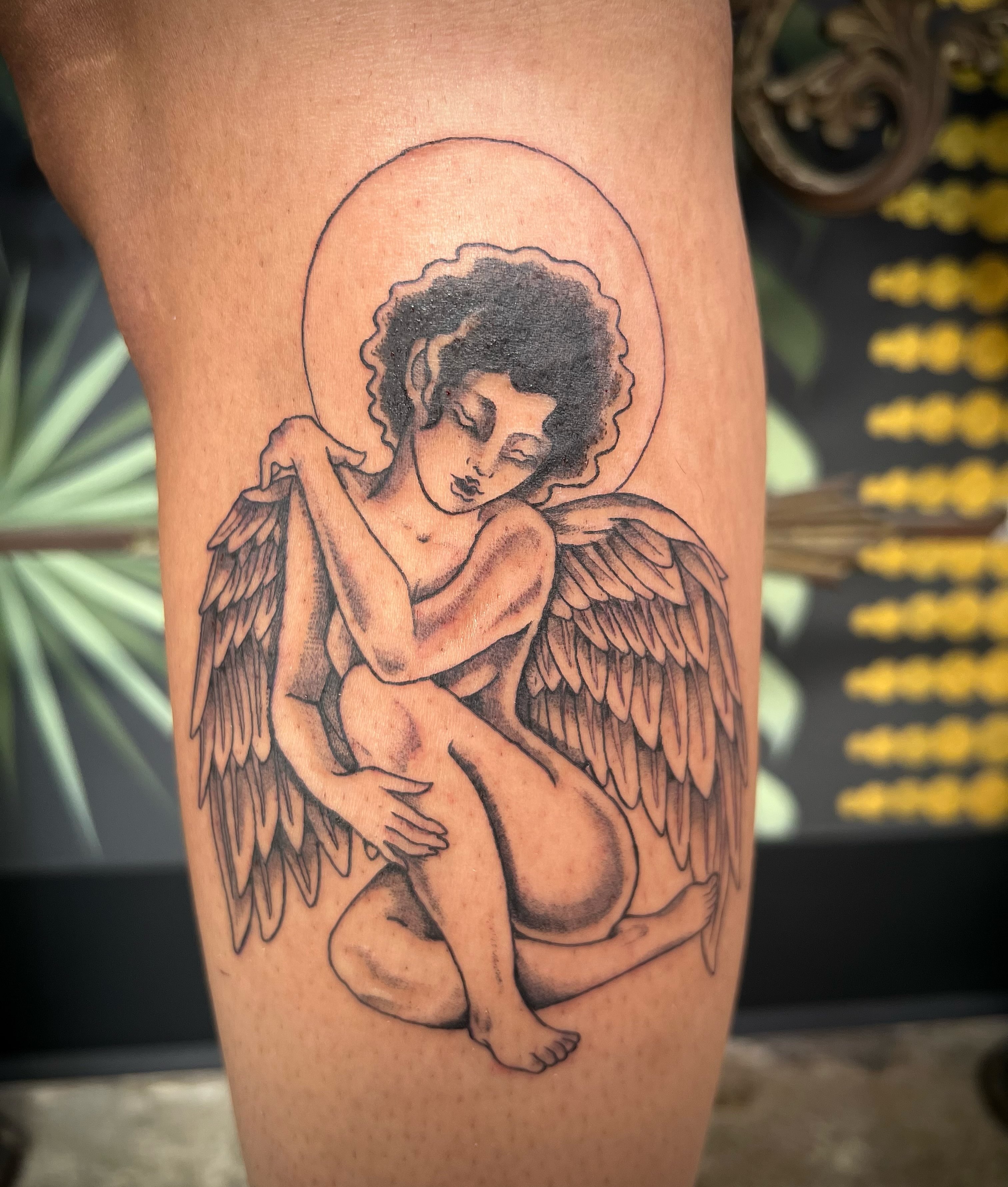 Angel black and grey tattoo on the thigh by Natalie Phillips, Oakland, California