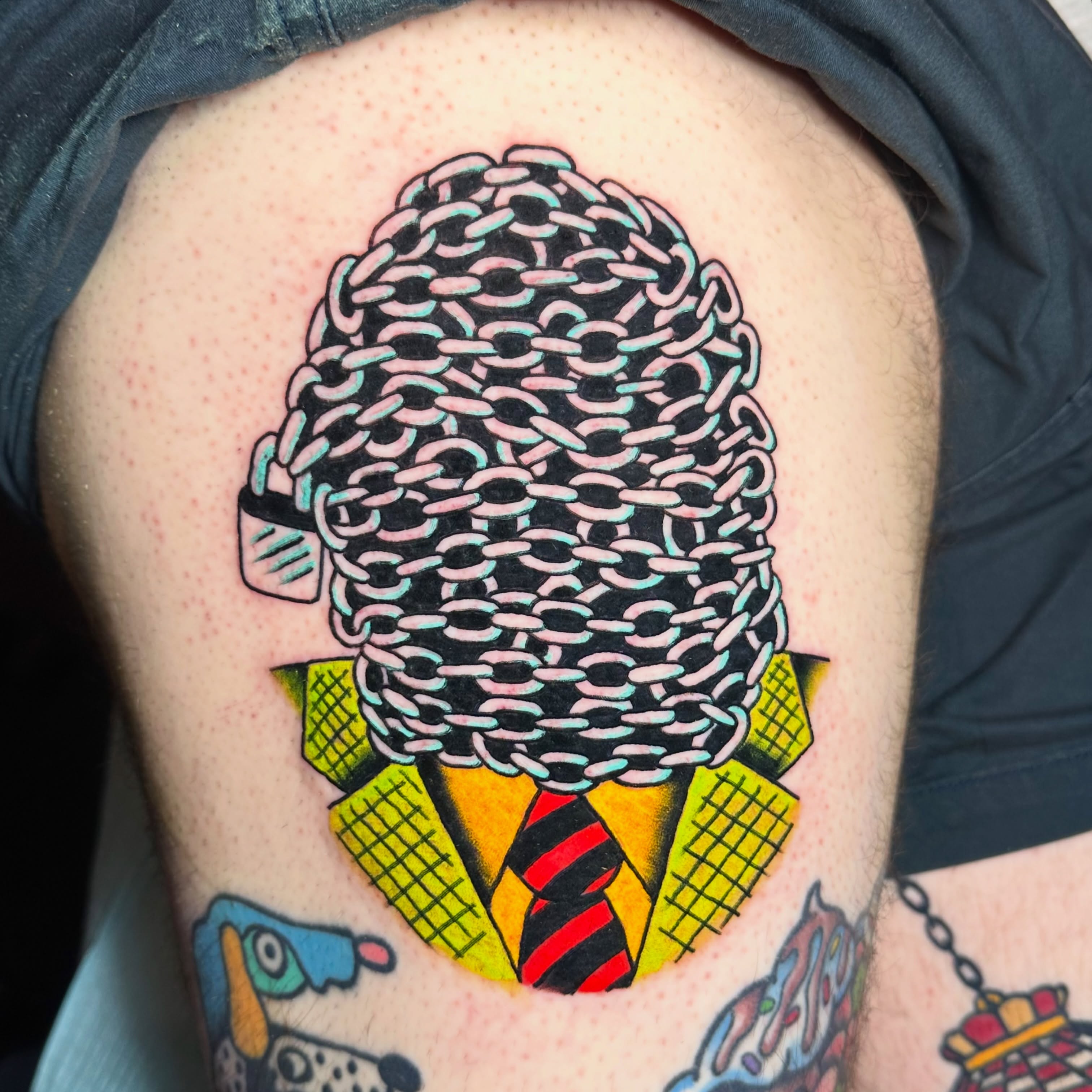Chainmail helmet American traditional tattoo on the thigh by Kiki Painmaker Trad Tattooer 🧨
