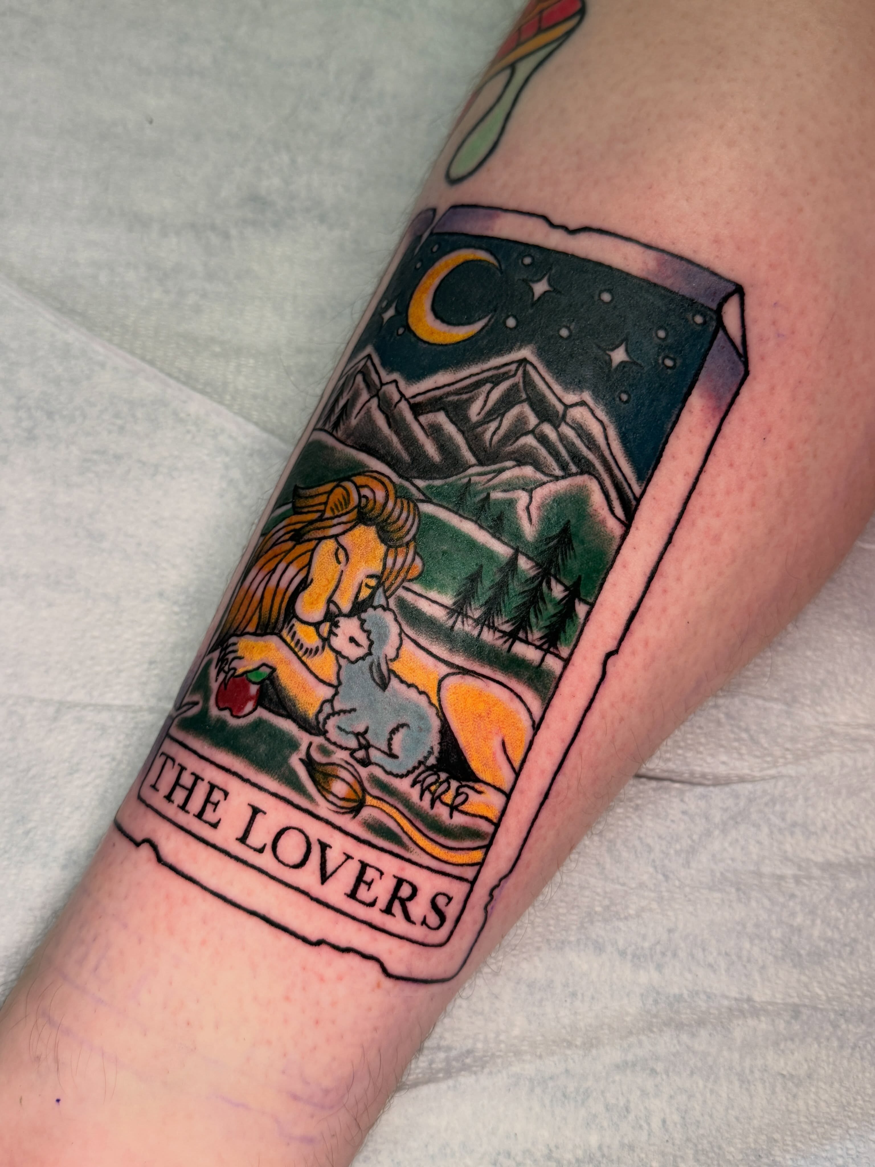 The Lovers tarot card American traditional tattoo on the forearm by Michelle
