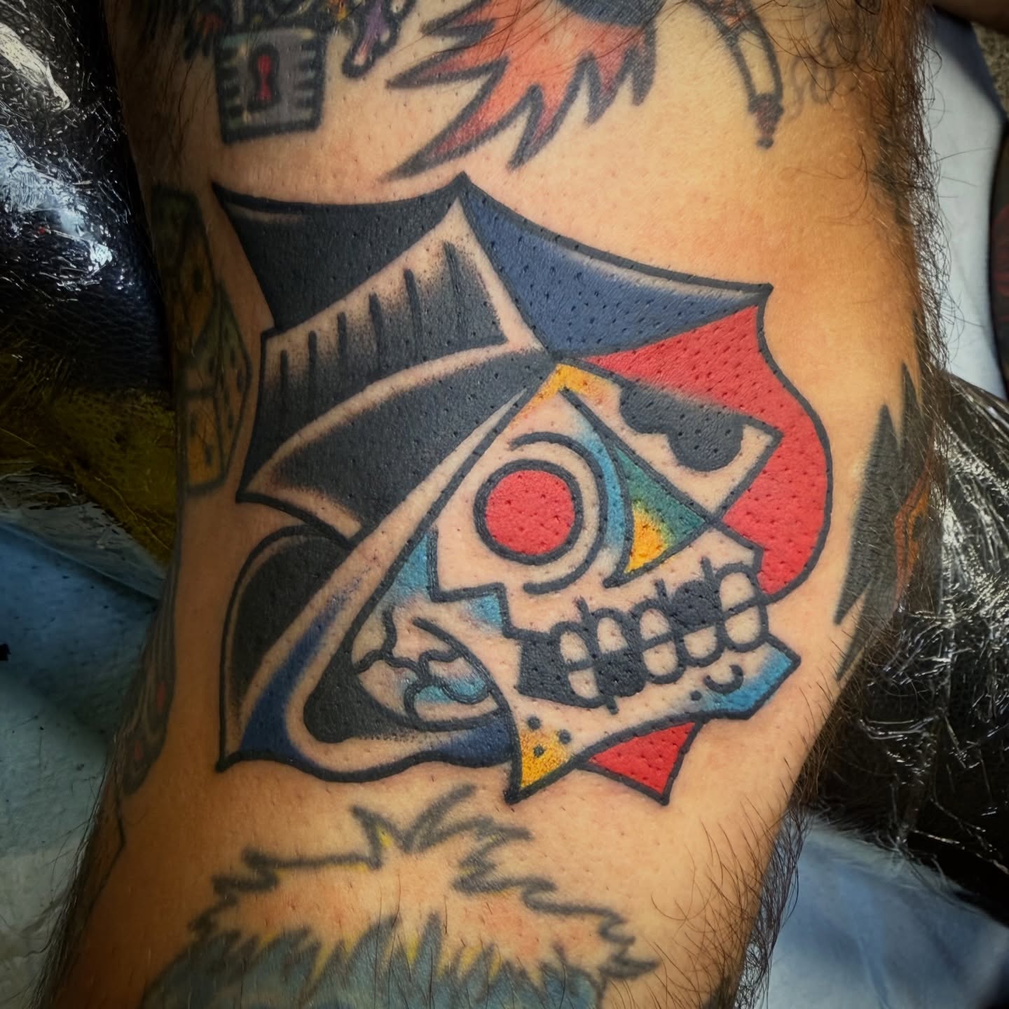 Skull American traditional tattoo on the forearm by Chuck Paprocki, Nashville, Tennessee