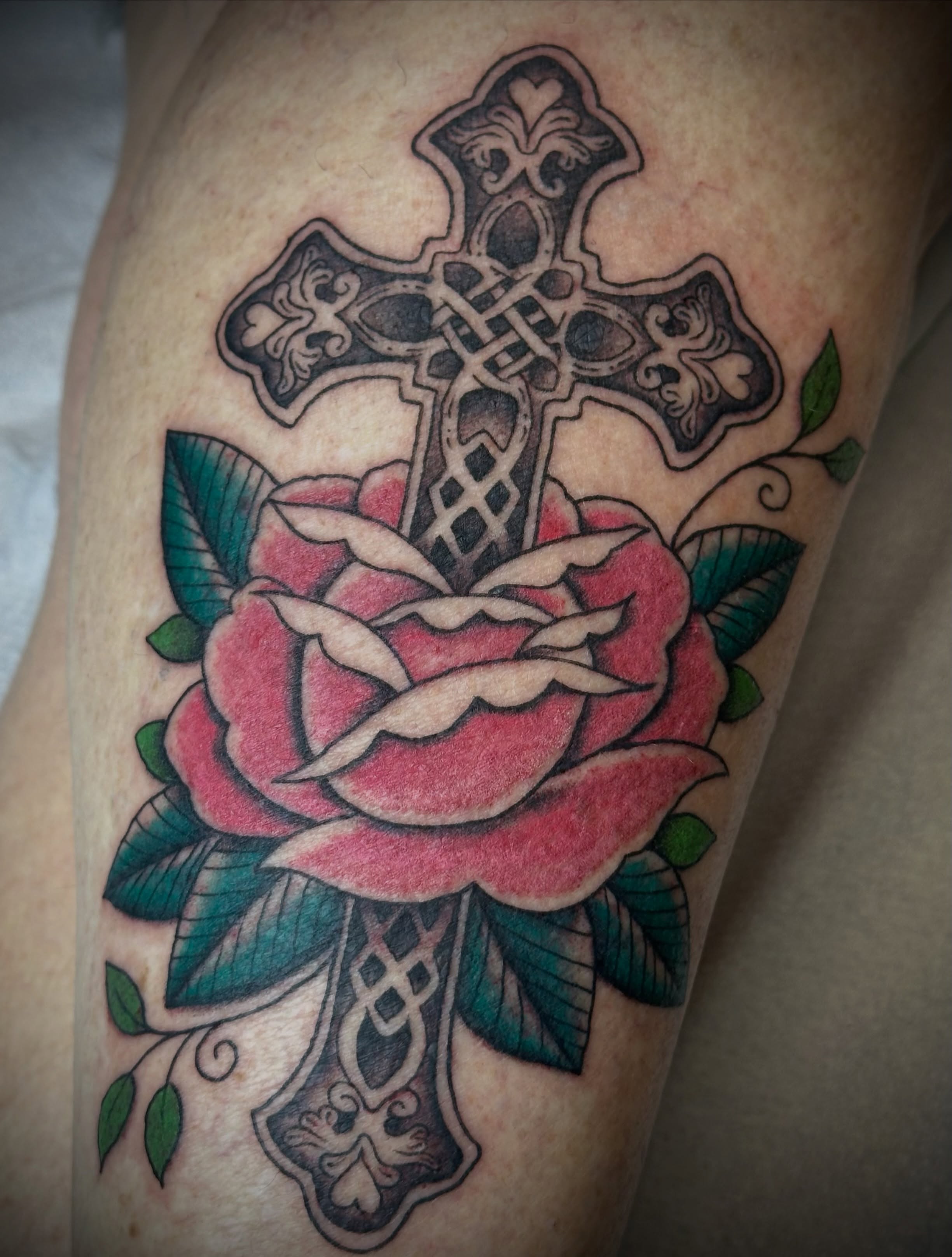 Cross and rose American traditional tattoo on the thigh by 🥀Chloe Miller