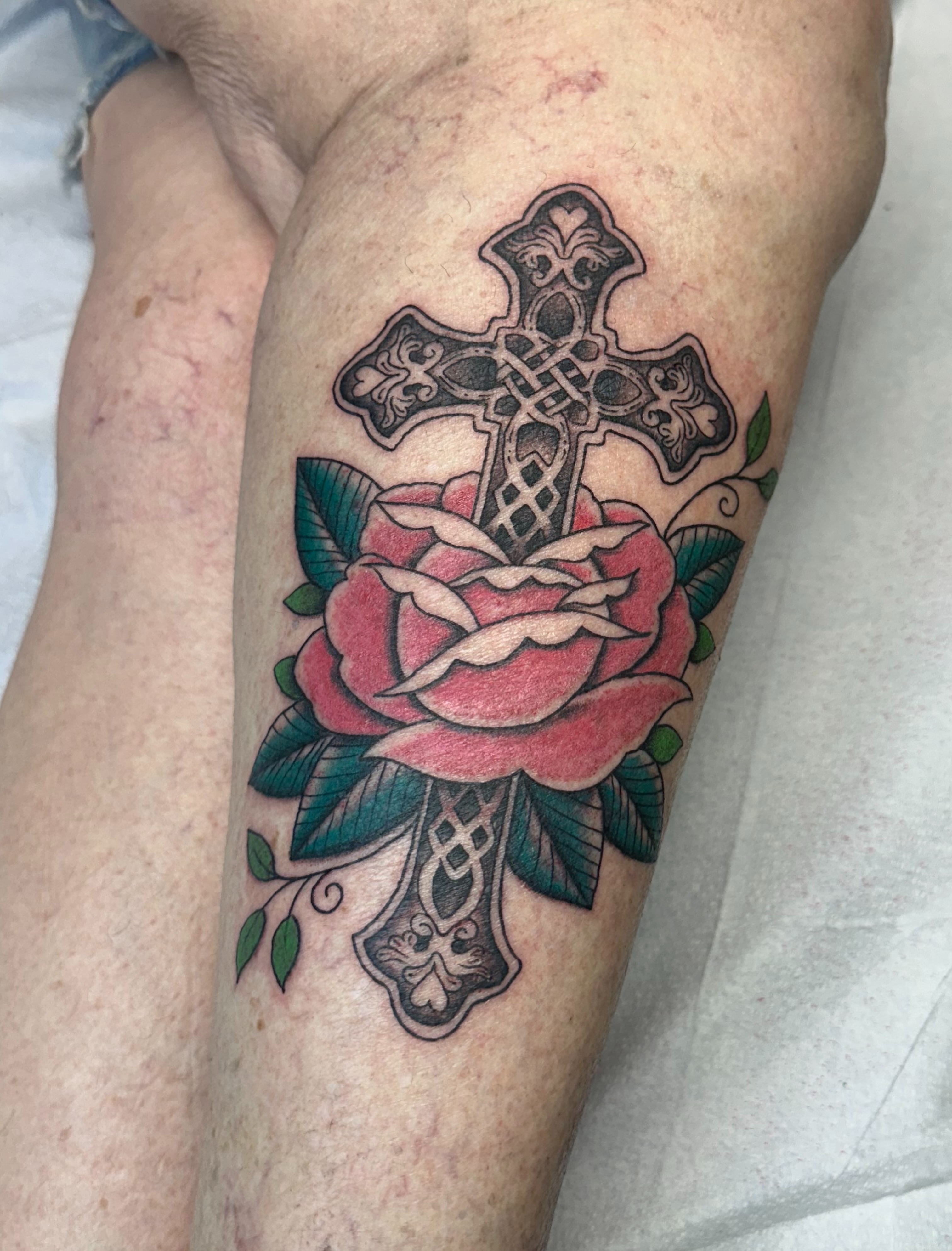 Cross and rose American traditional tattoo on the thigh by 🥀Chloe Miller