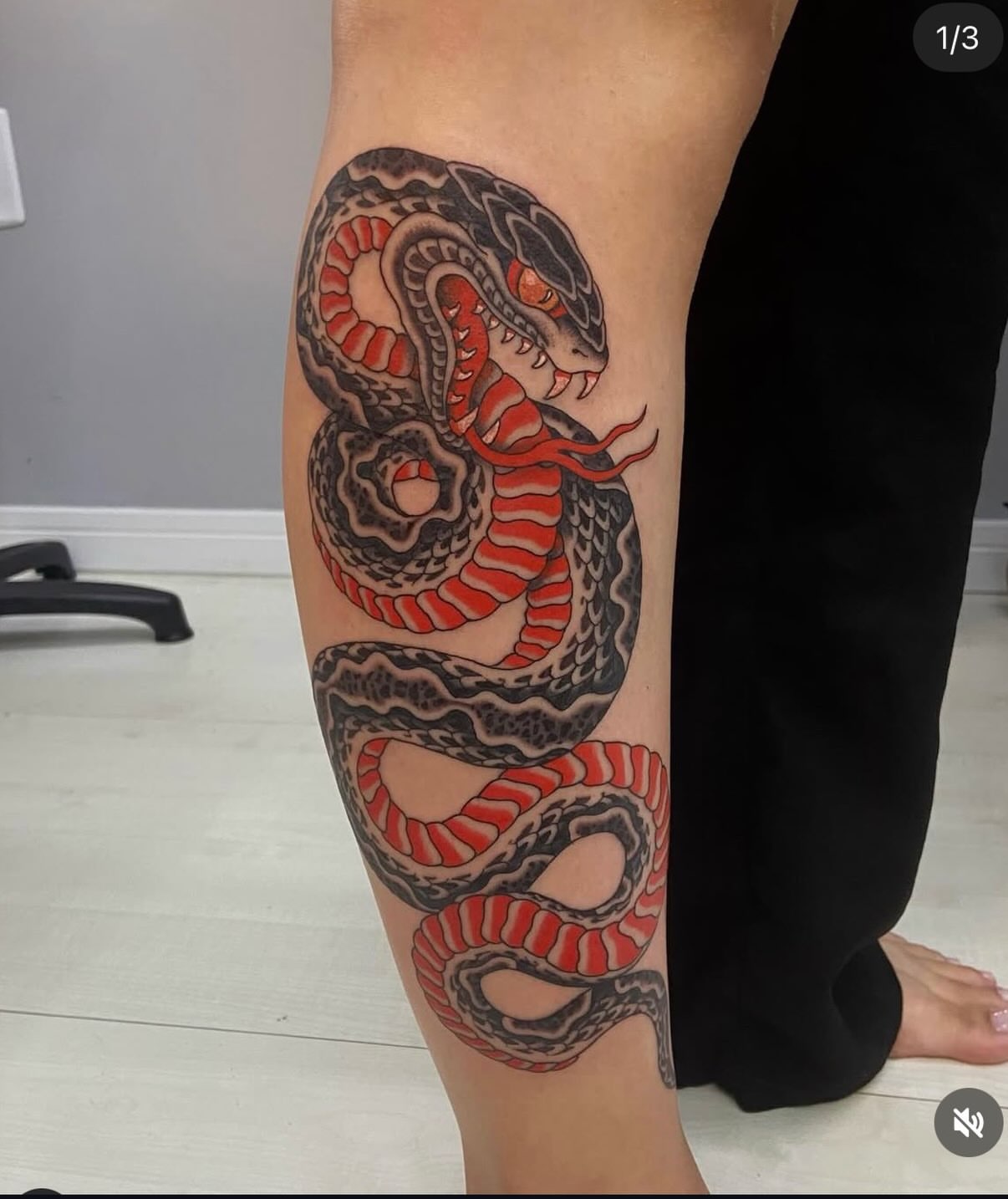 Snake American traditional tattoo on the calf by Lucas Naganuma