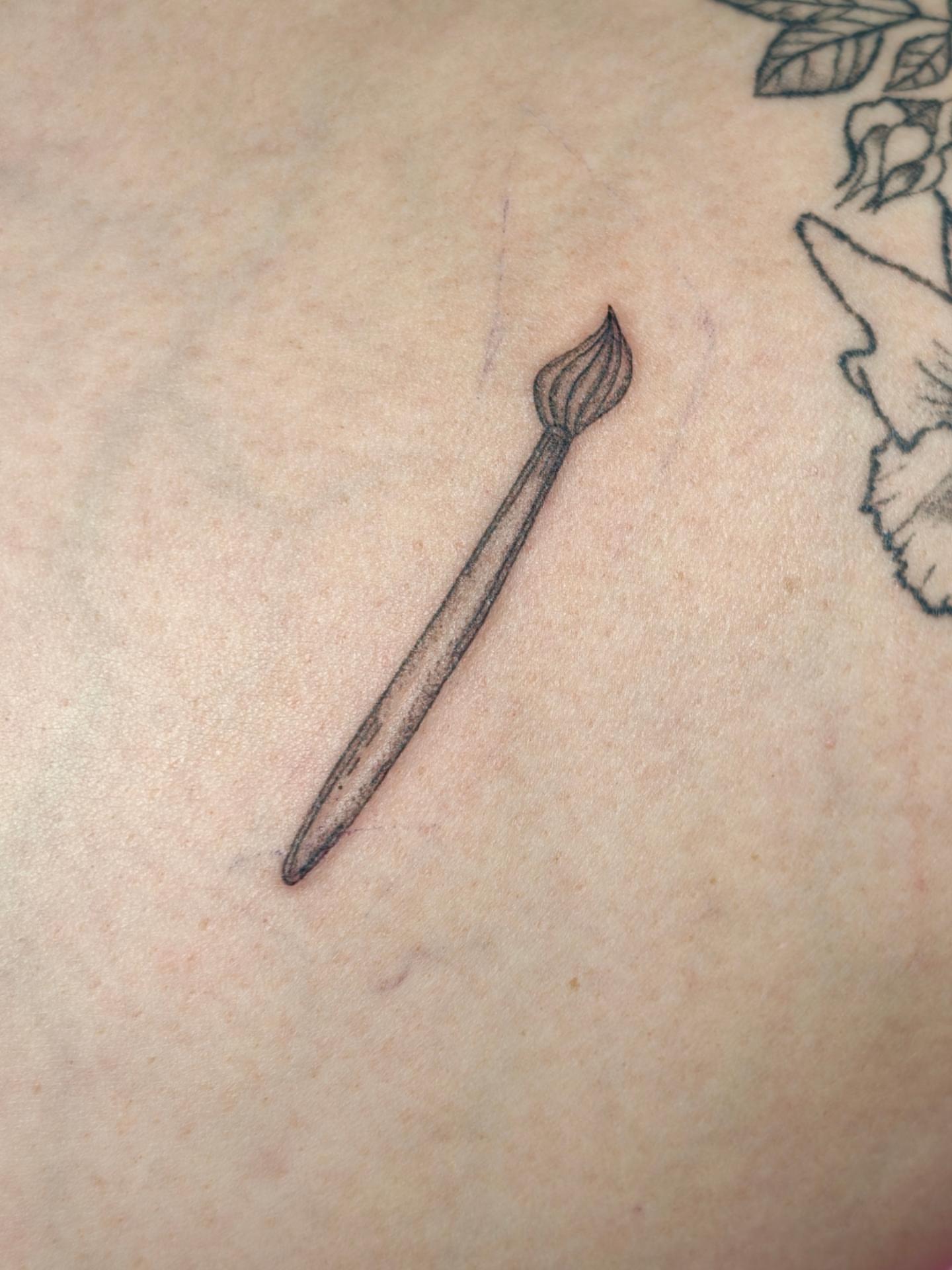 Paintbrush black and grey tattoo on the torso by Dani Sandoval, Anaheim, California