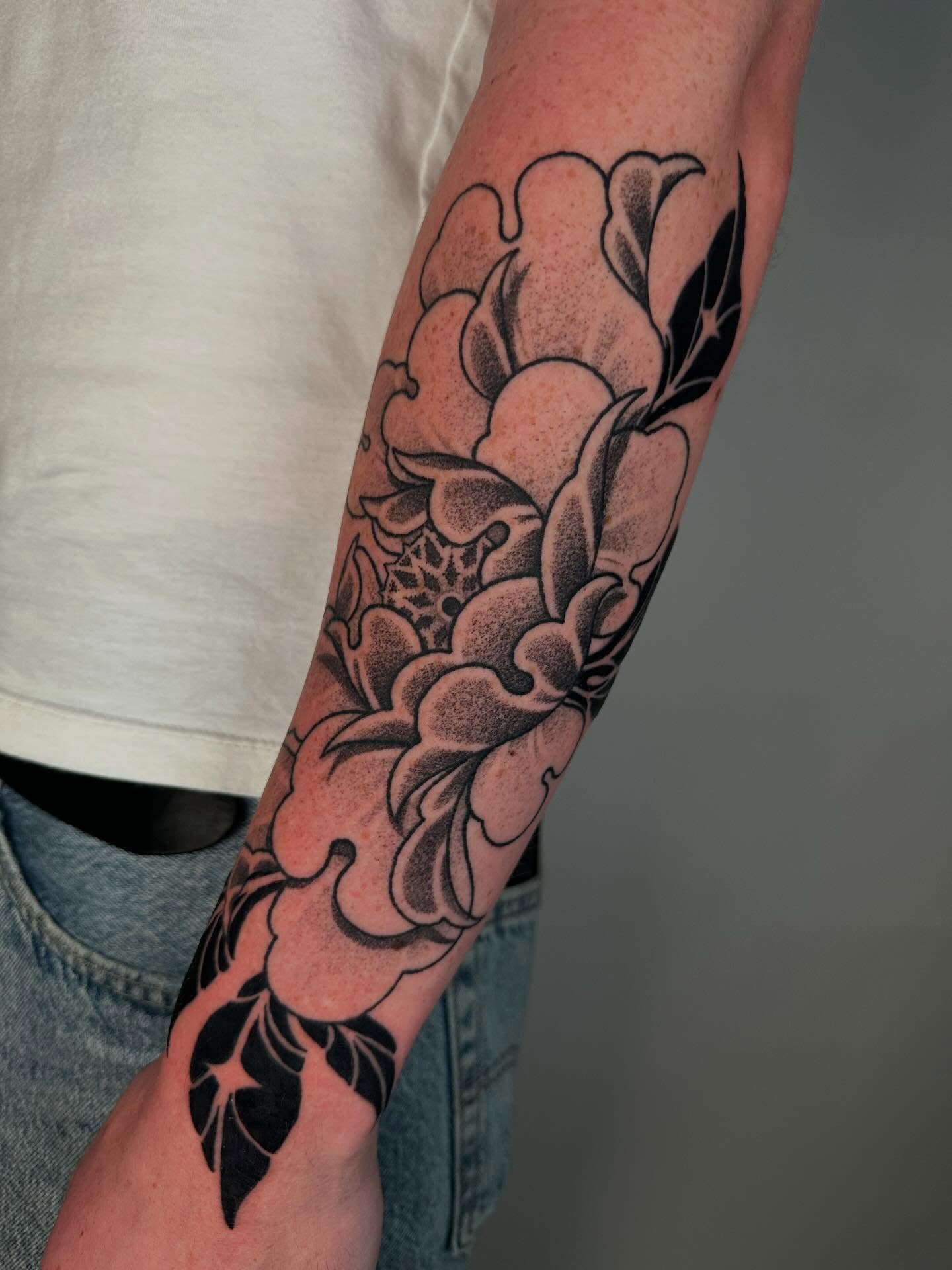 Peony dotwork tattoo on the forearm by Will Spencer