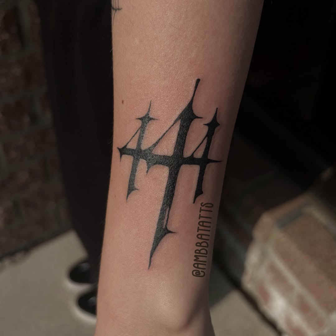 Cross black and grey tattoo on the forearm by amber brady, Brunswick, Ohio