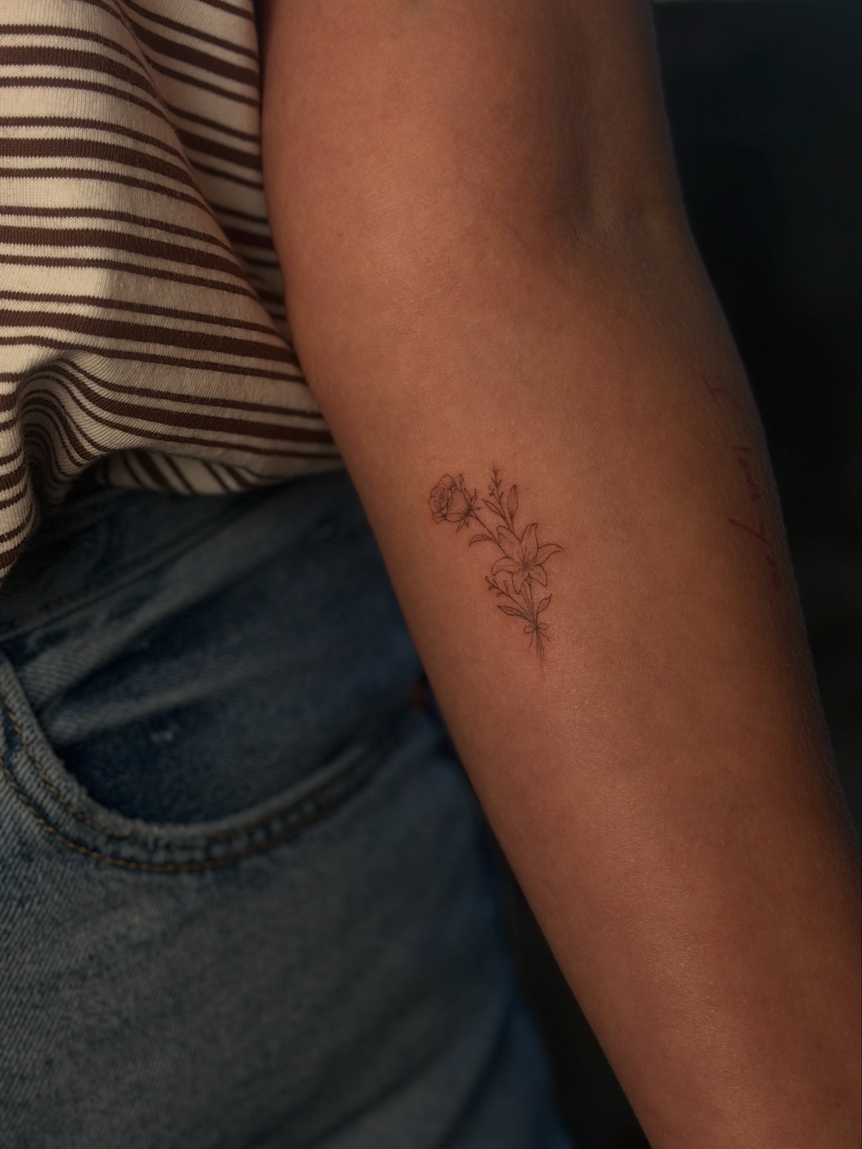 Floral arrangement fine line tattoo on the forearm by 𝙸𝚗𝚔𝚊𝚗𝚍𝚕𝚒𝚕𝚢𝚜 🤎💉🐻🌸