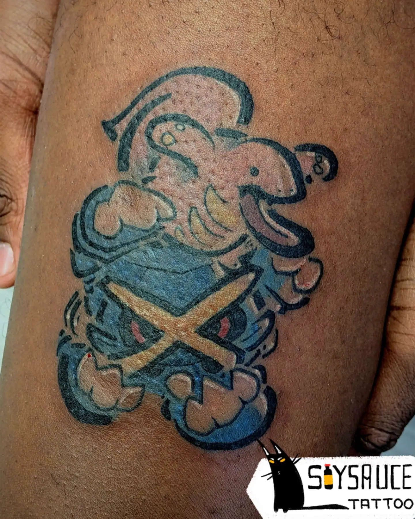 Pirate skull and crossbones American traditional tattoo on the forearm by Zoe Aucoin