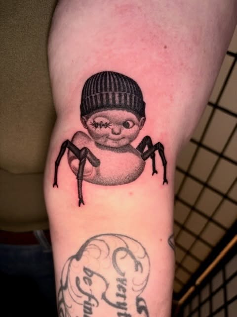 Spider baby black and grey tattoo on the forearm by Tash ๐โ๐ฉ