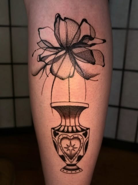Flower in vase black and grey tattoo on the forearm by Tash ๐โ๐ฉ