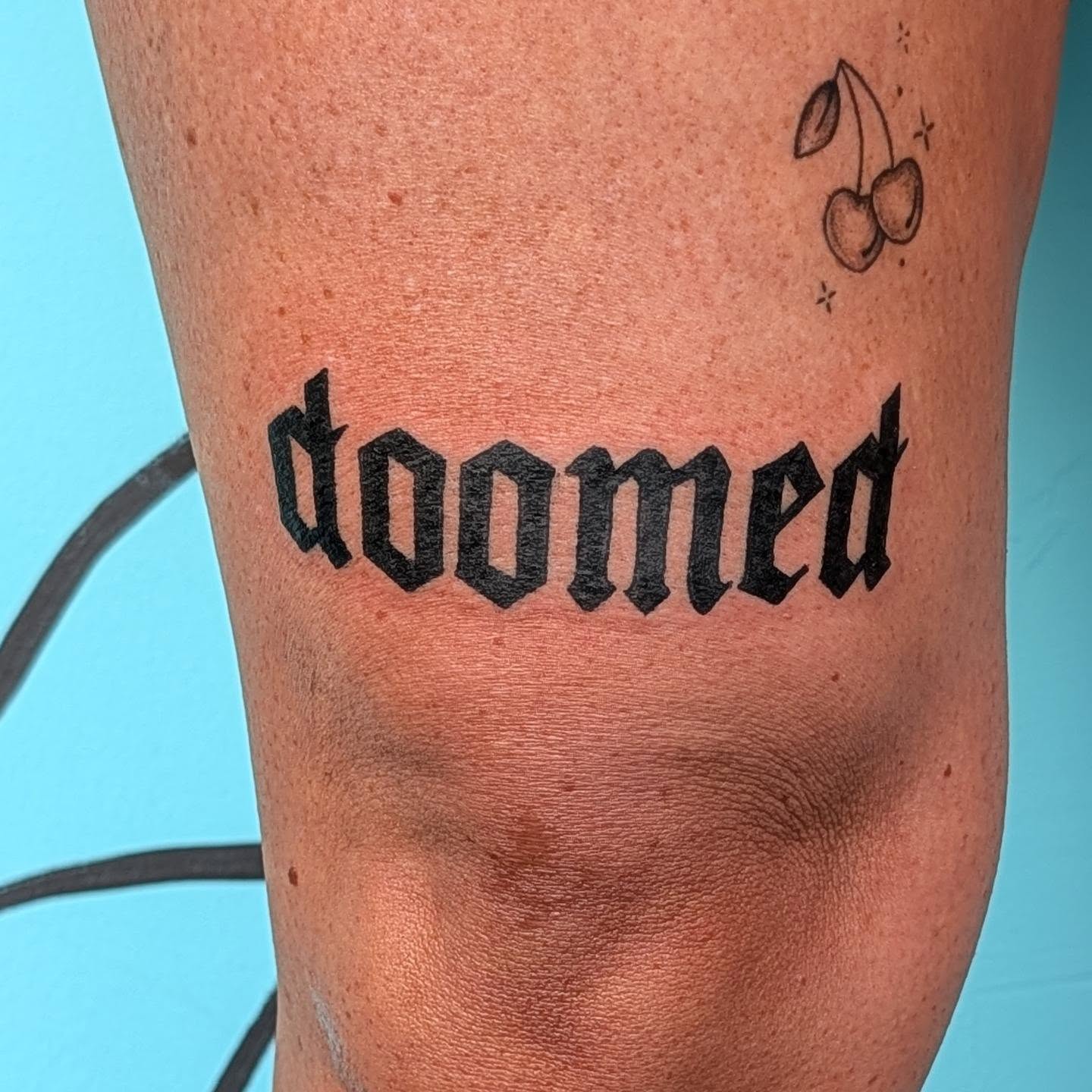 Tattoo by @_punkroctopus — lettering_script