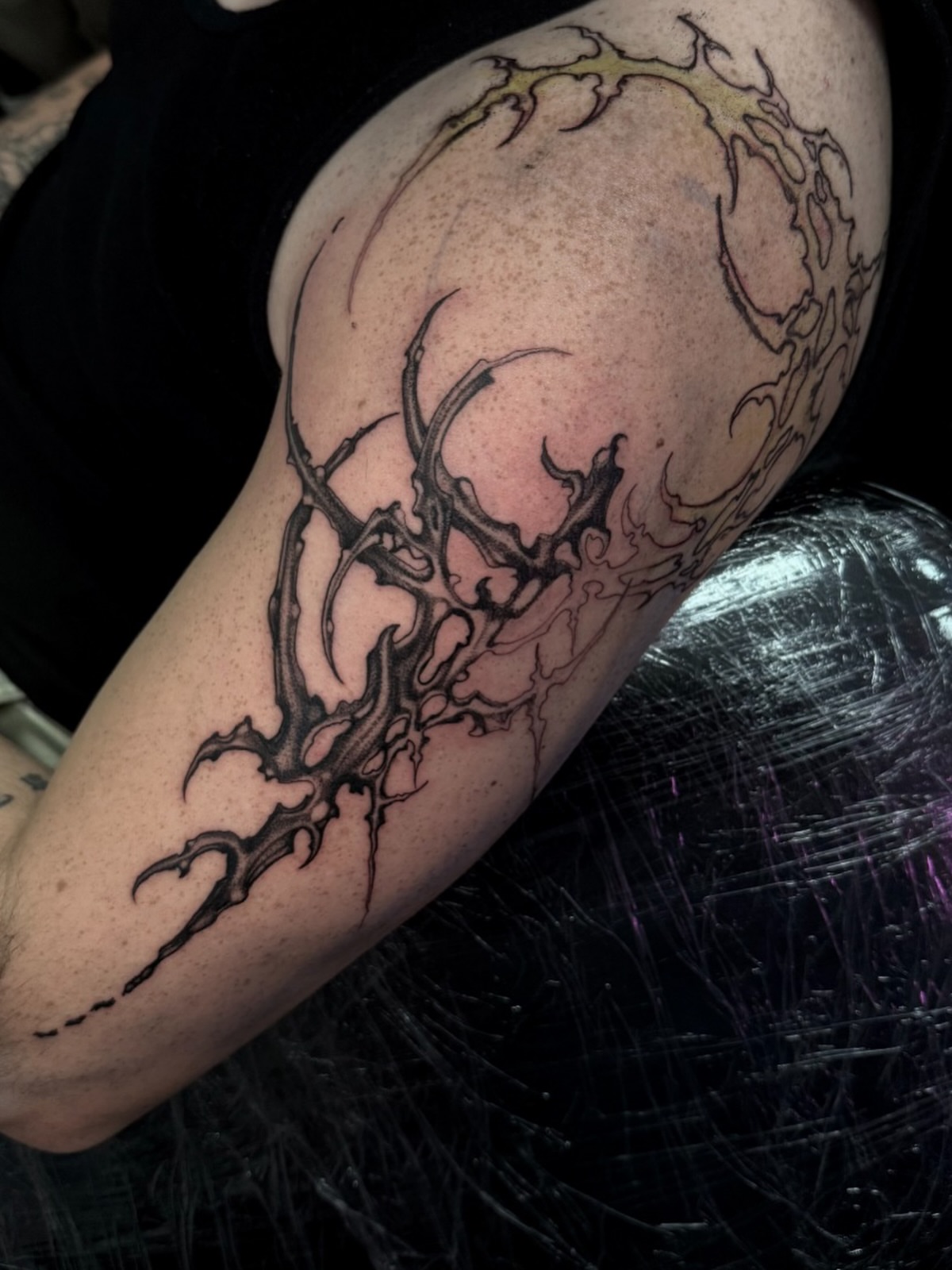 Thorned branch black and grey tattoo on the forearm by Tattoo Artist Vanessa
