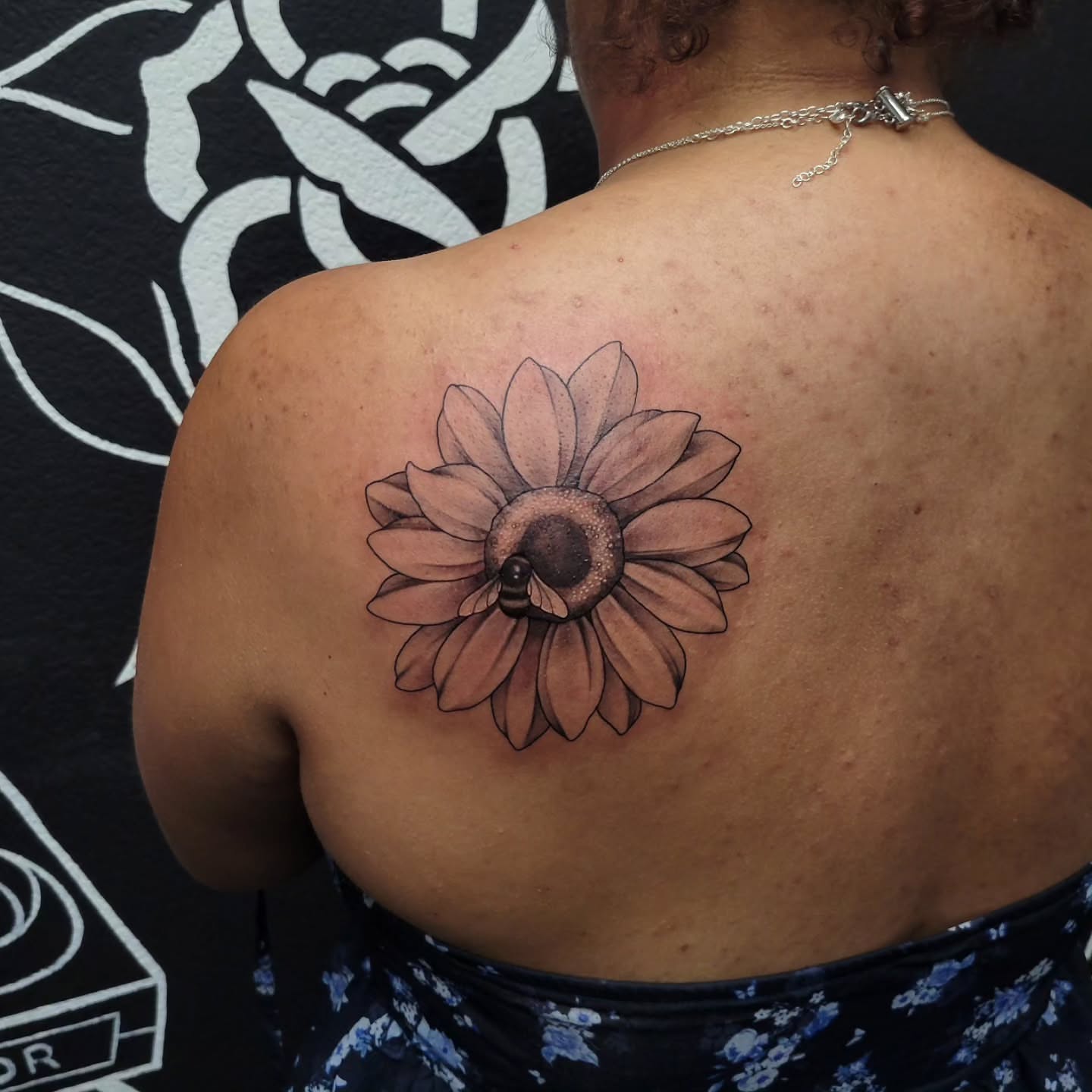 Sunflower realism tattoo on the back by Marina Cobb