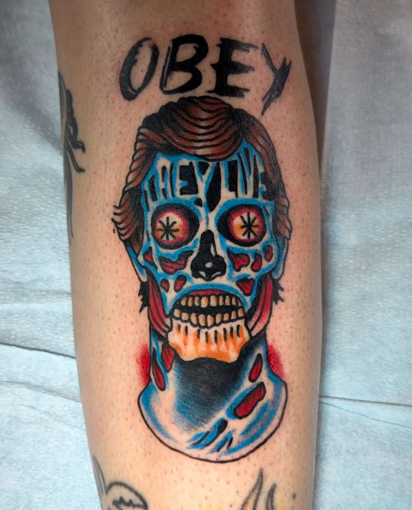 Zombie head American traditional tattoo on the forearm by Eric Ward