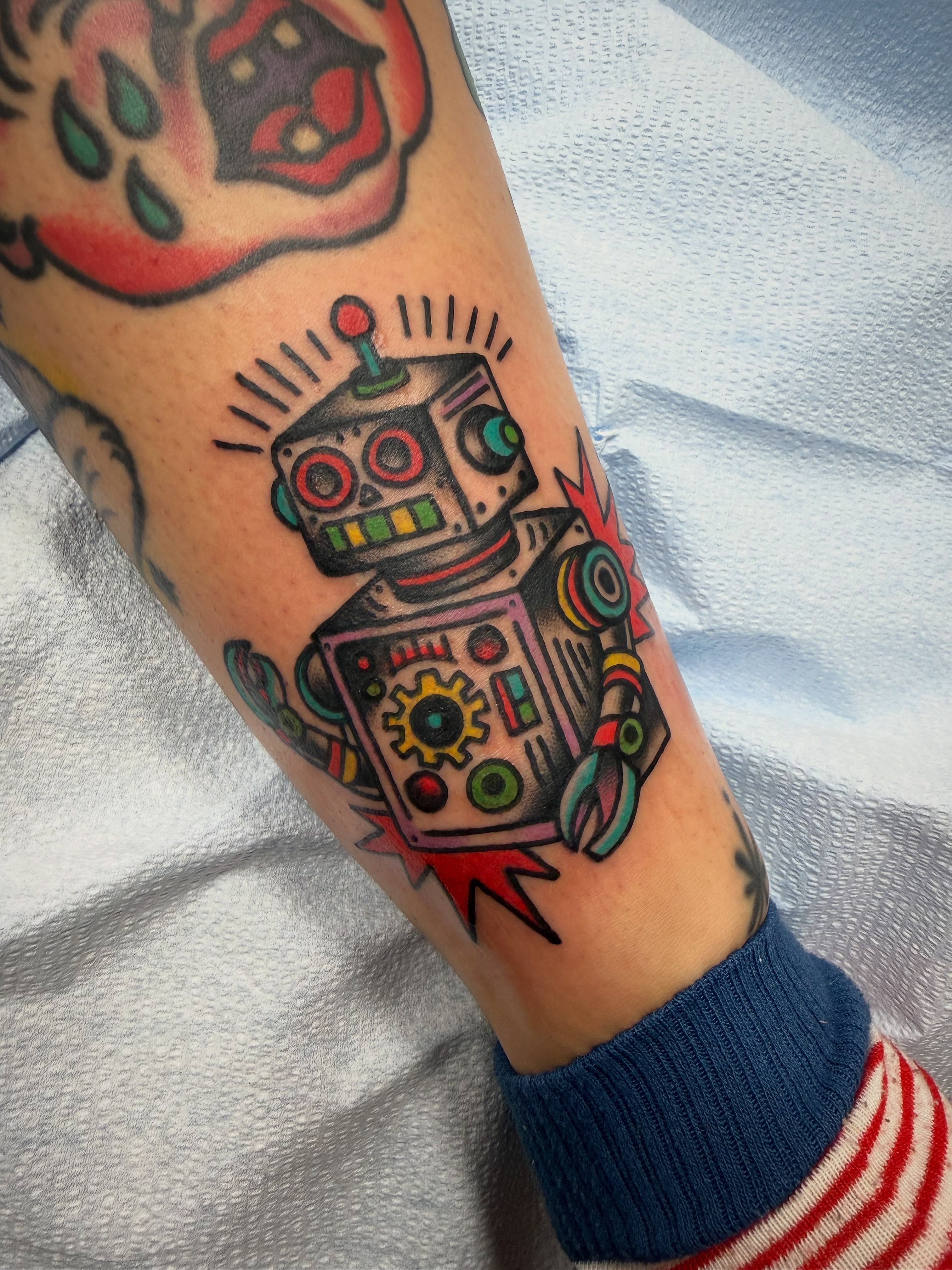 Robot American traditional tattoo on the forearm by Shannon Pagliarini