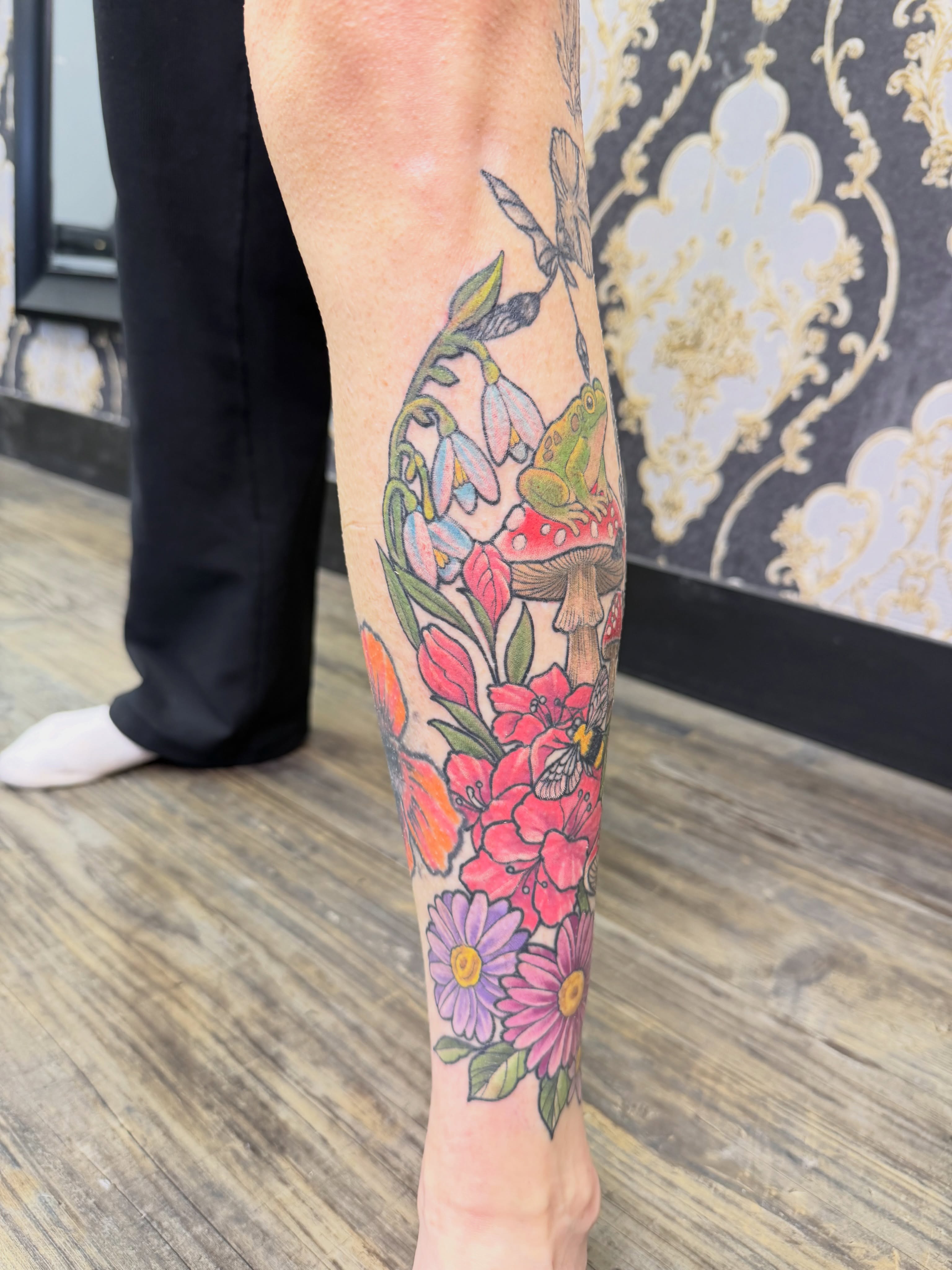 Floral bouquet new school tattoo on the forearm by TyAnne Schulte