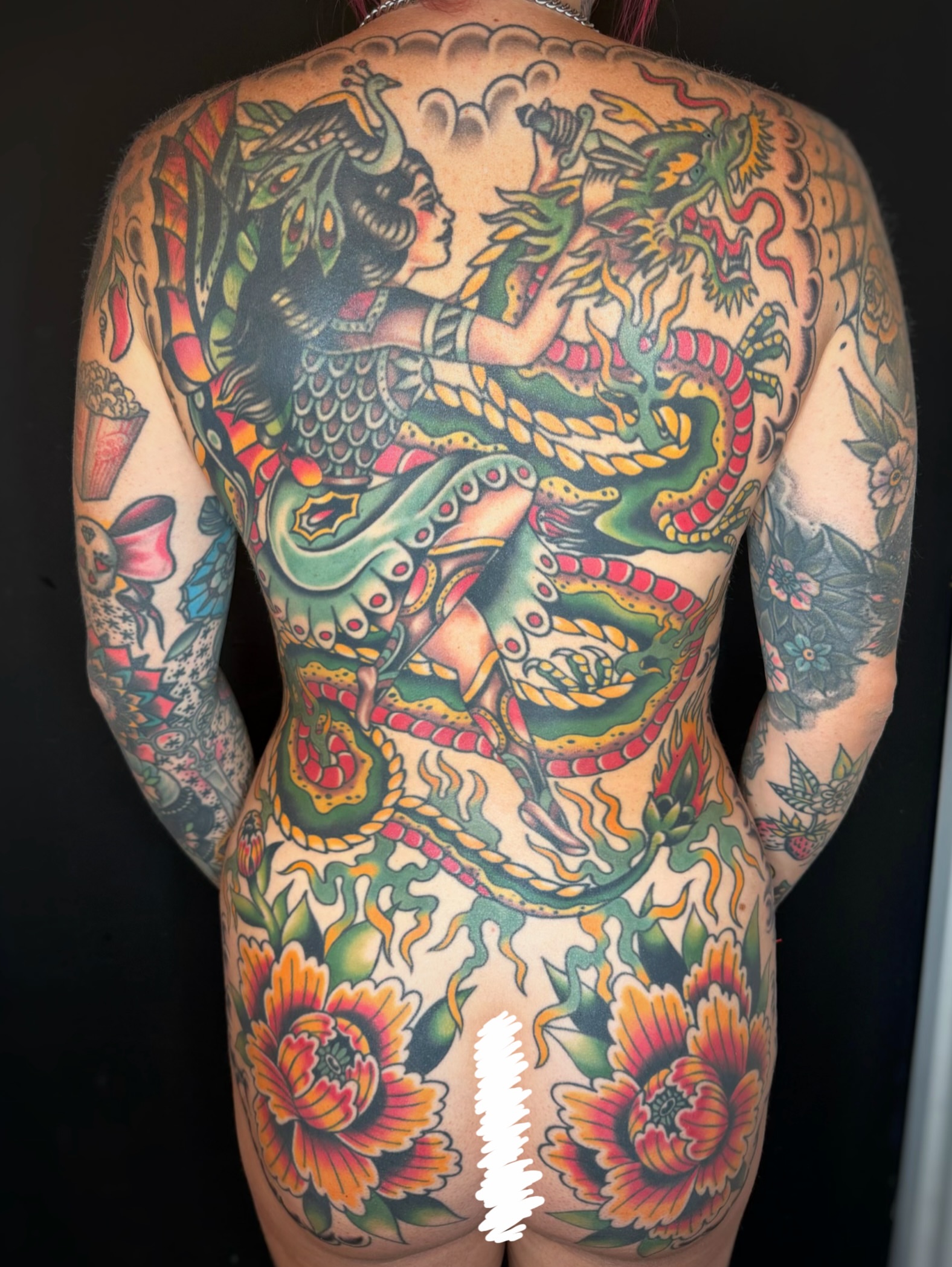 Mermaid and dragon American traditional tattoo on the back by Cori James Tattoo Artist