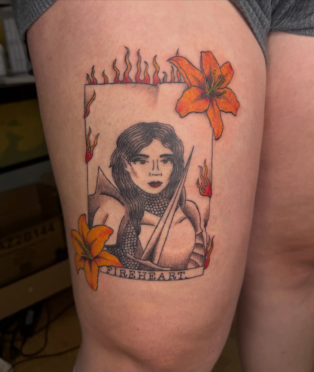 Fireheart dotwork tattoo on the thigh by Giana Masso