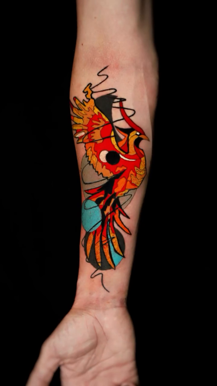Phoenix watercolor tattoo on the forearm by Yana Aizen