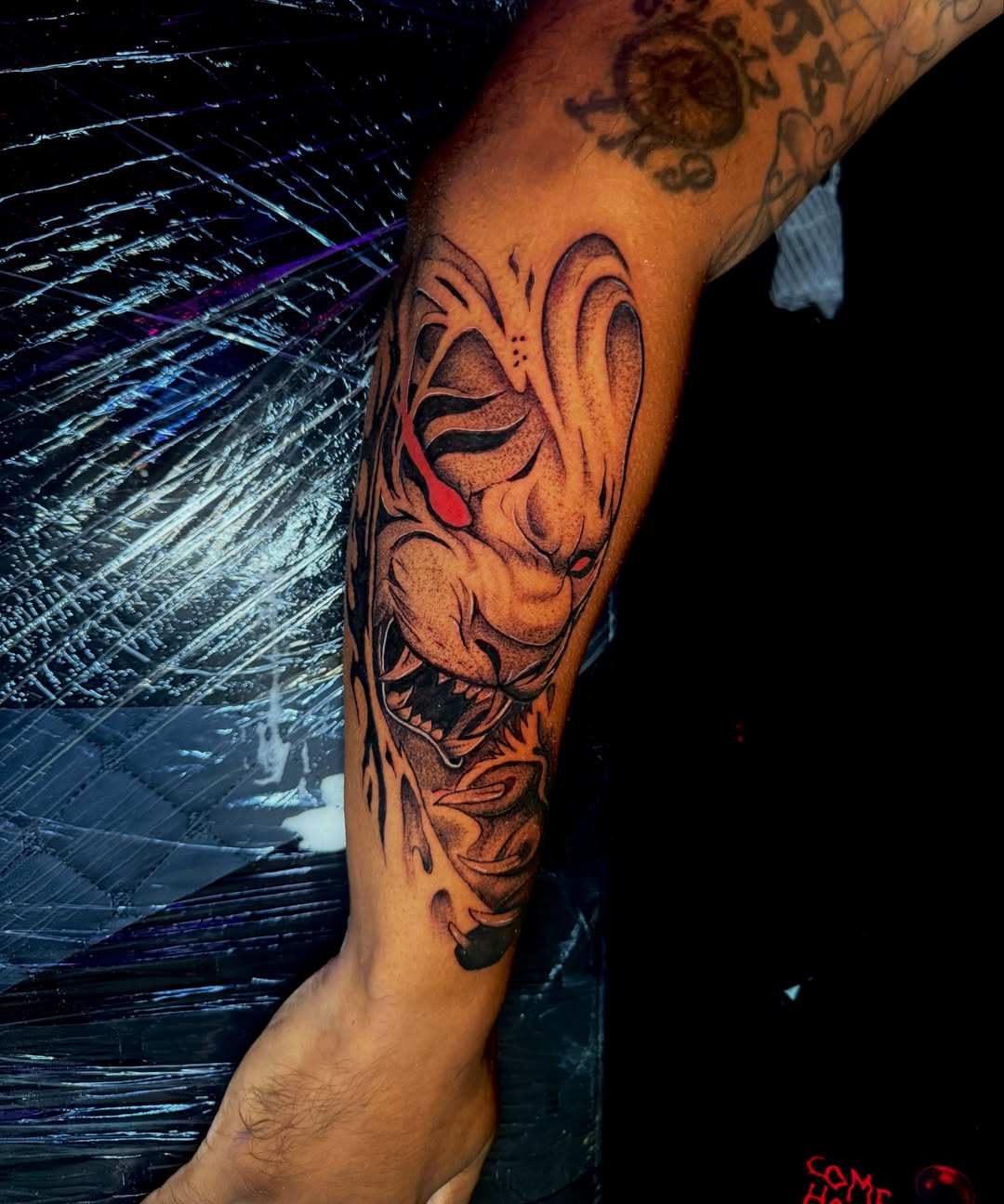 Dragon realism tattoo on the forearm by Kelsoink