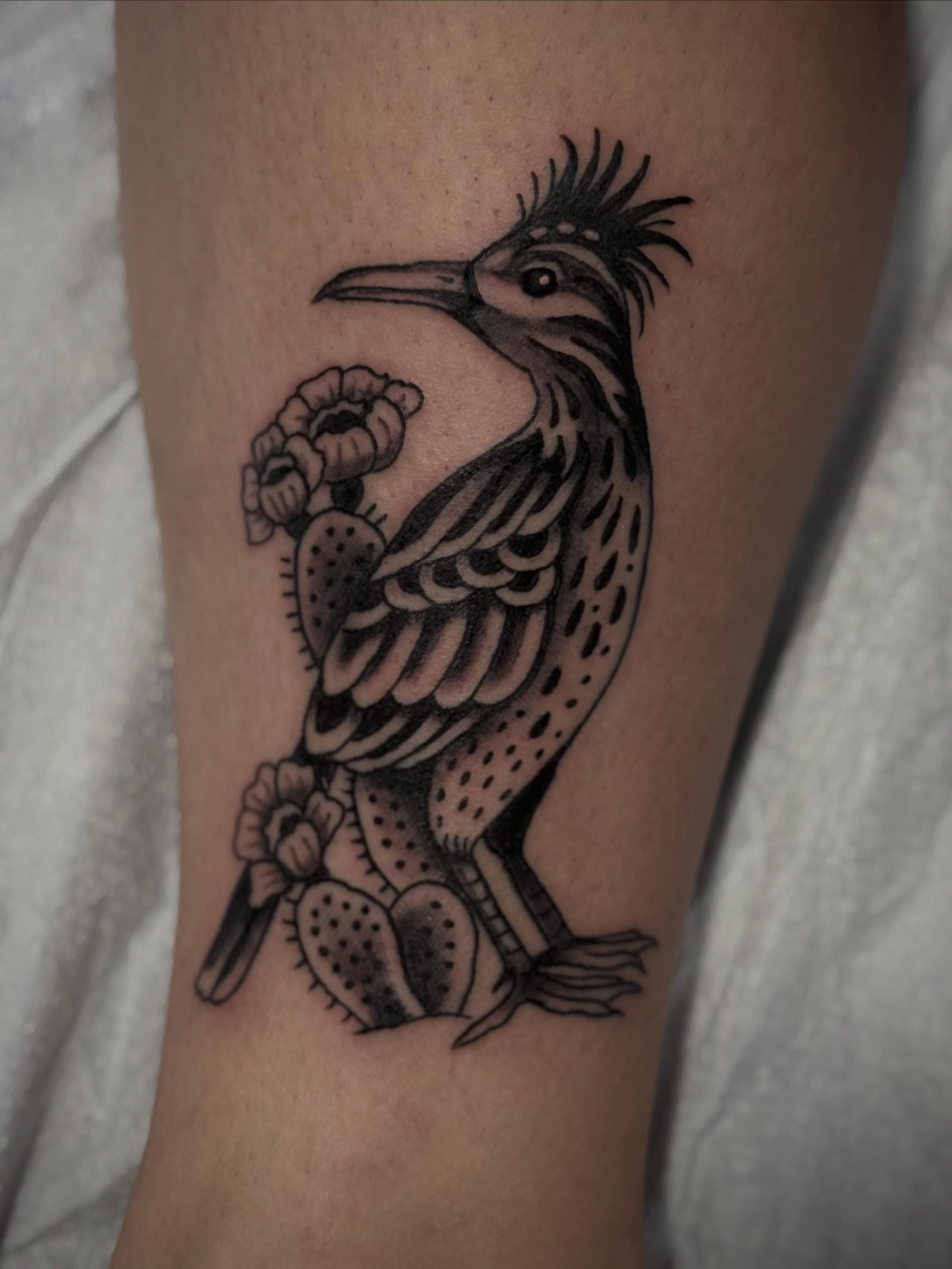 Roadrunner black and grey tattoo on the forearm by Micah Norman, San Francisco, California