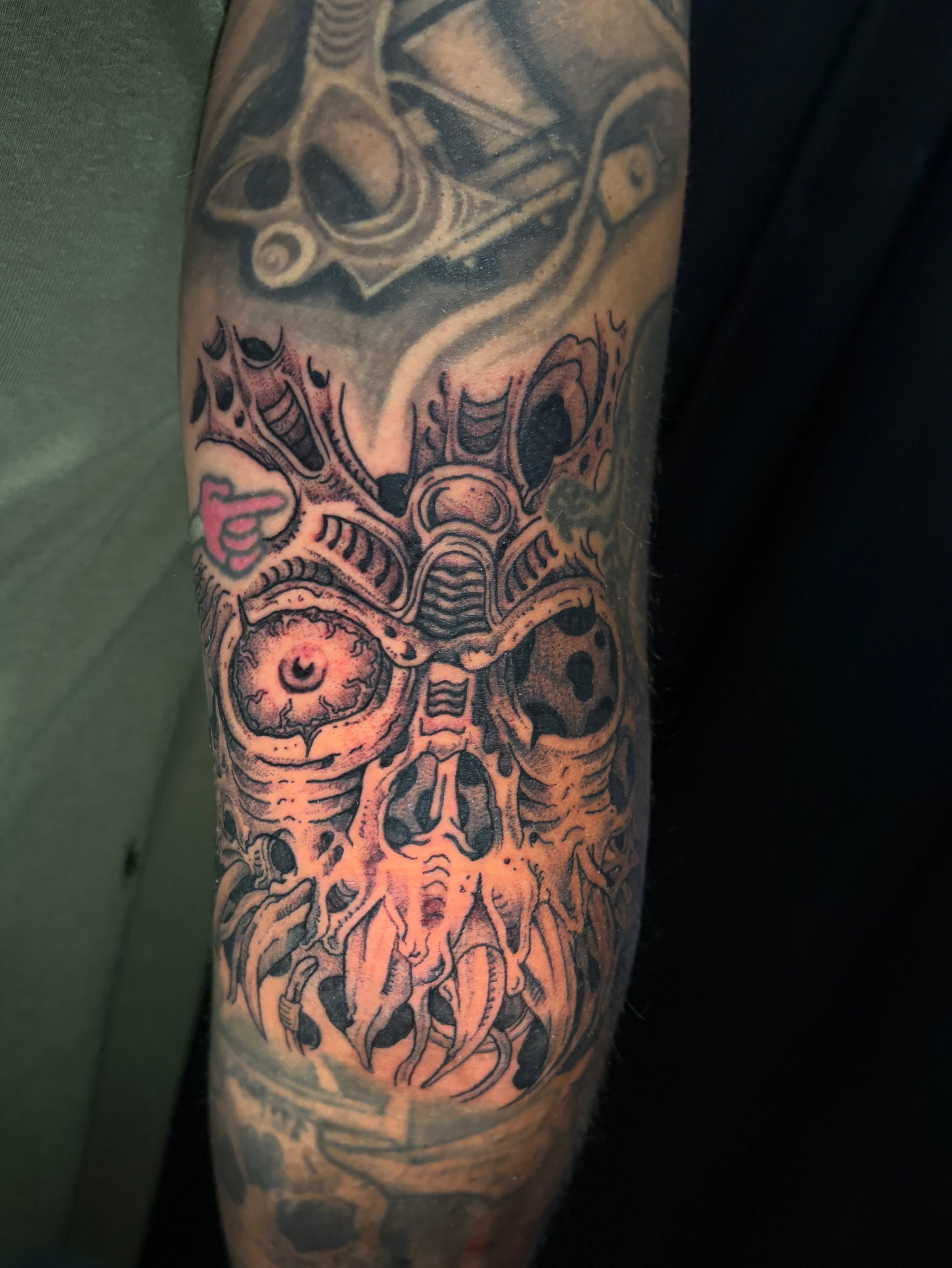 Mechanical skull geometric tattoo on the forearm by Crawlspacecadet