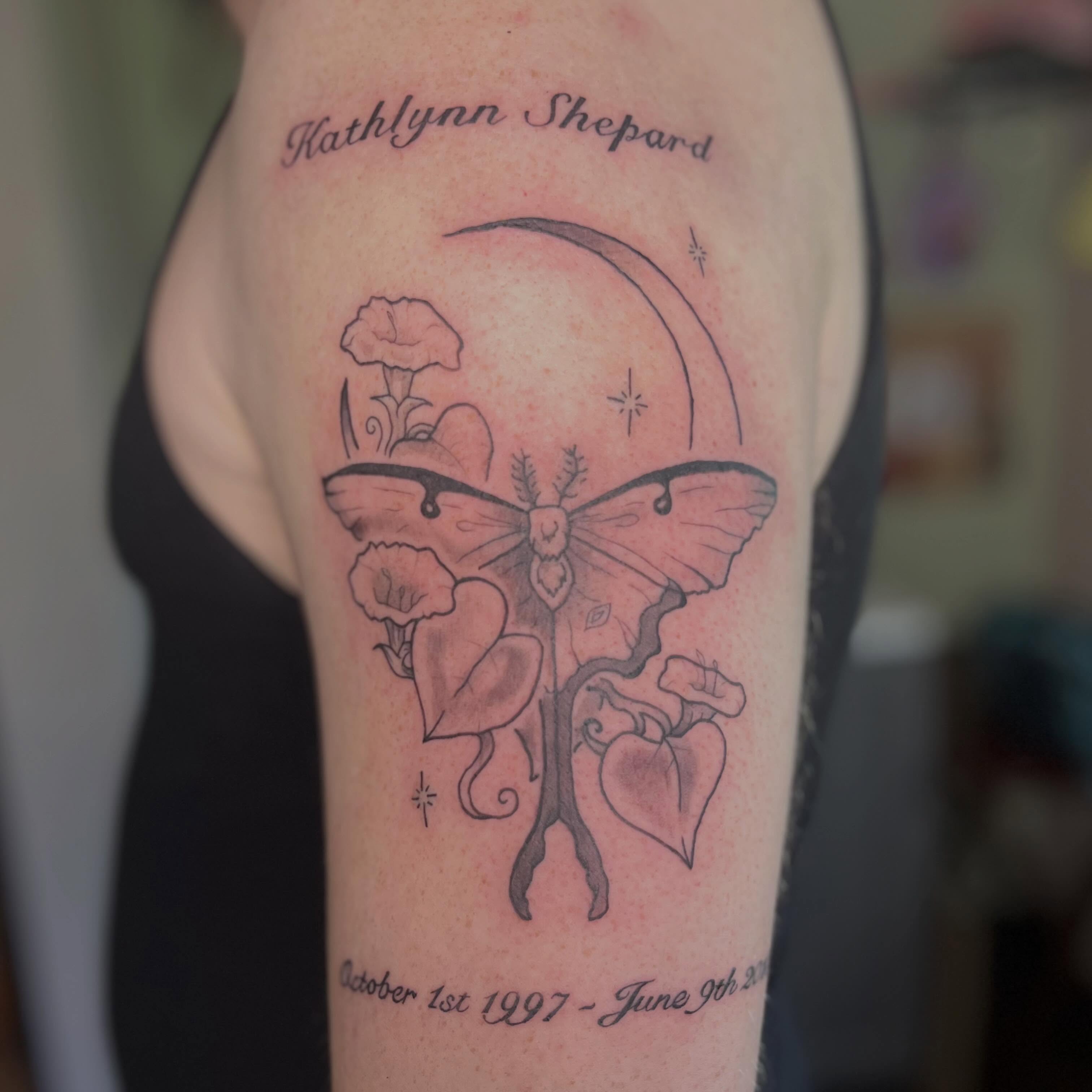 Butterfly and hearts black and grey tattoo on the forearm by Jazzy