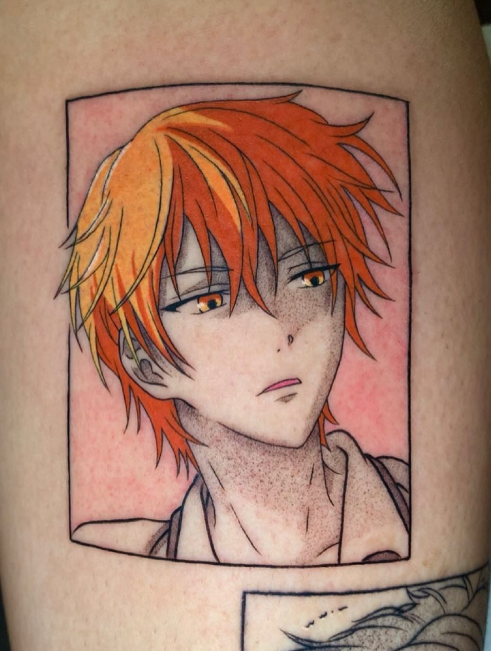 Anime character anime tattoo on the upper arm by Maddie Rees