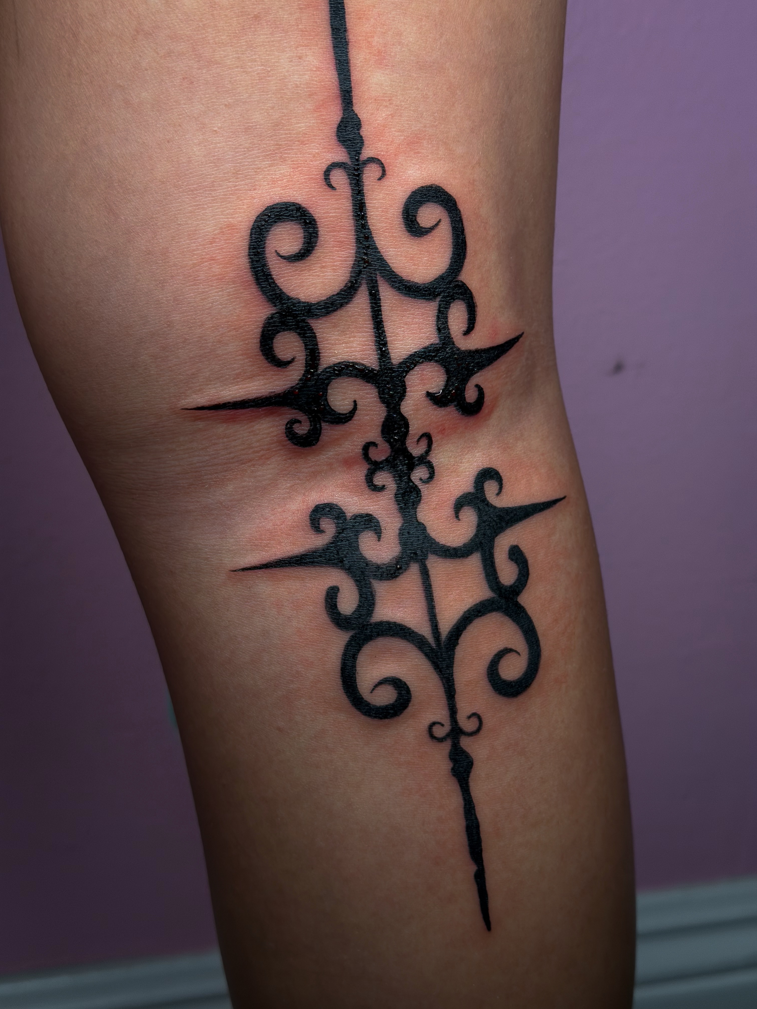 Scrollwork black and grey tattoo on the forearm by Tattoo Artist X Kamm, Salt Lake City, Utah