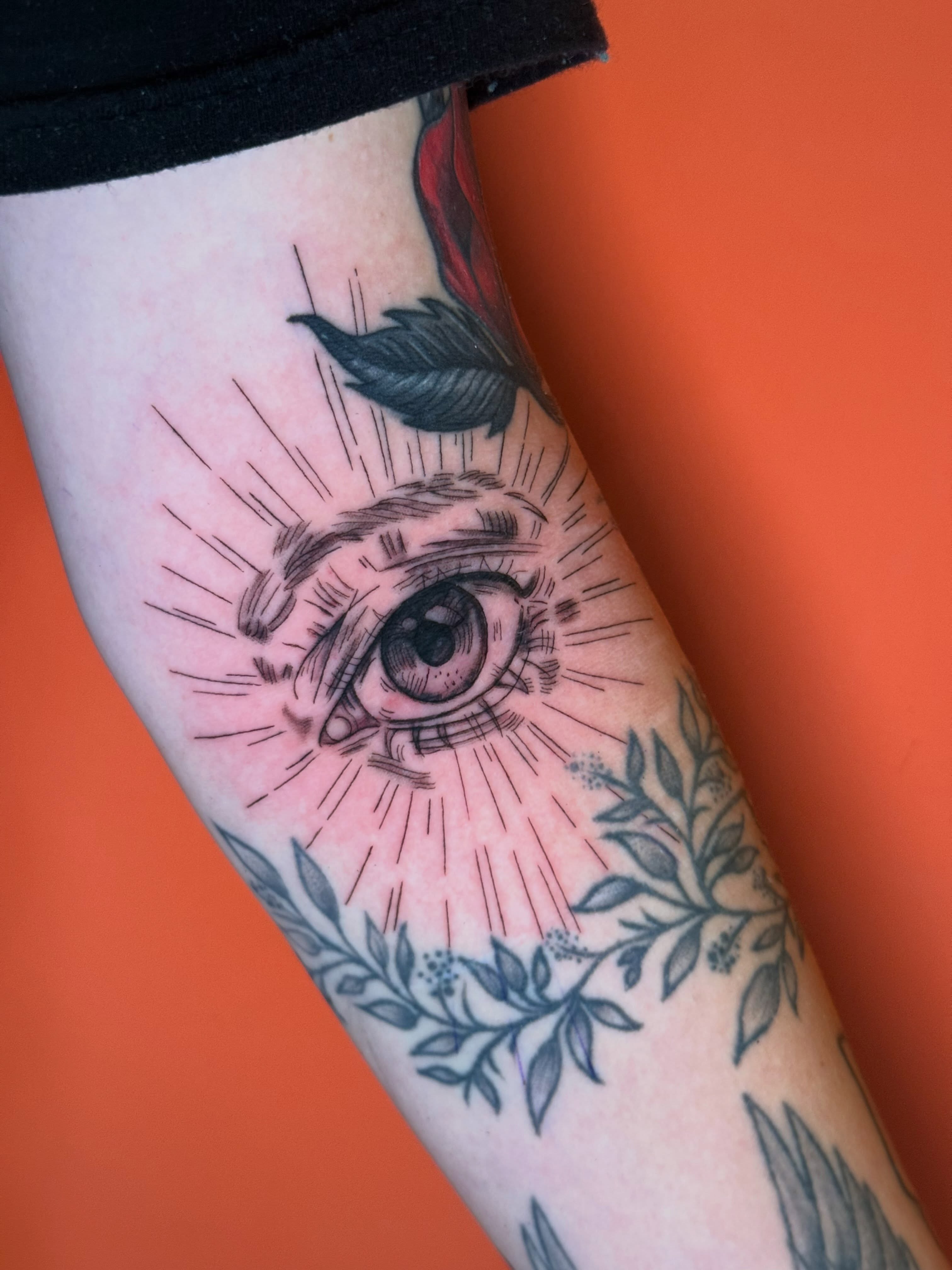 Eye with feather neo-traditional tattoo on the forearm by dotMX
