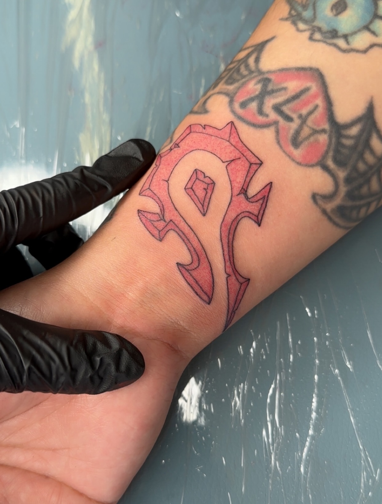 Abstract symbol geometric tattoo on the forearm by NuNu
