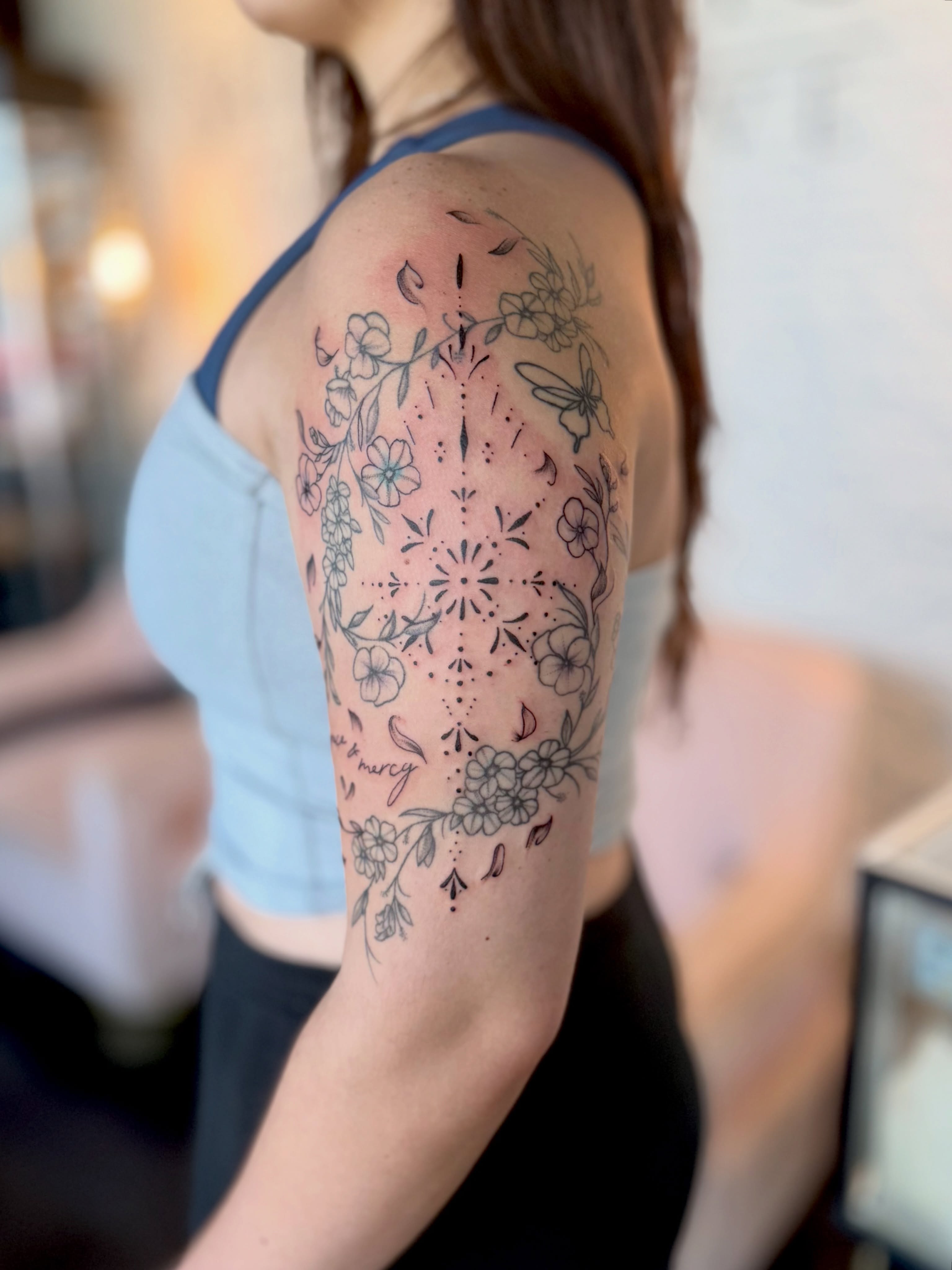 Floral mandala dotwork tattoo on the shoulder by Kyndall Lynn, Waxahachie, Texas