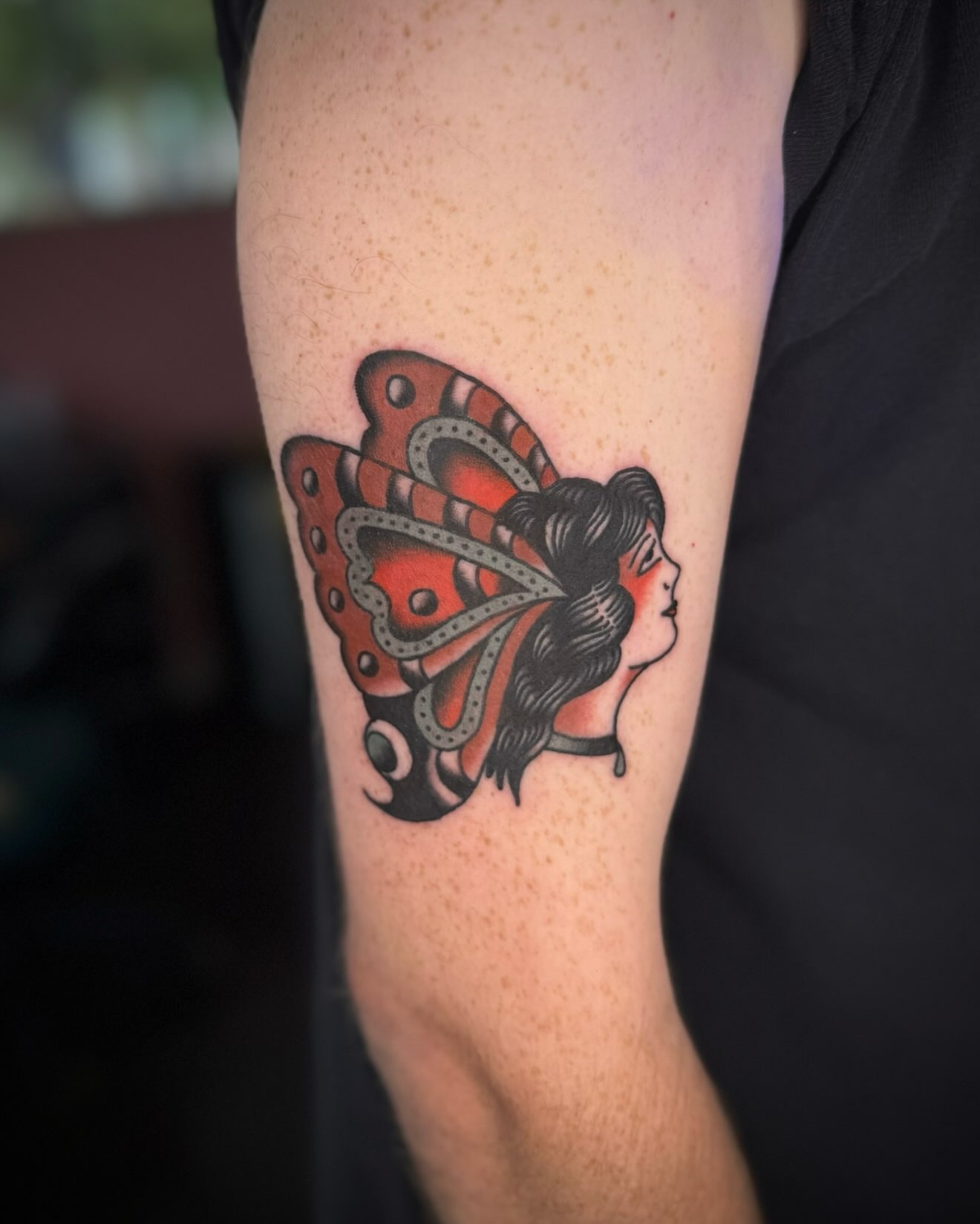 Butterfly American traditional tattoo on the forearm by kalli berry