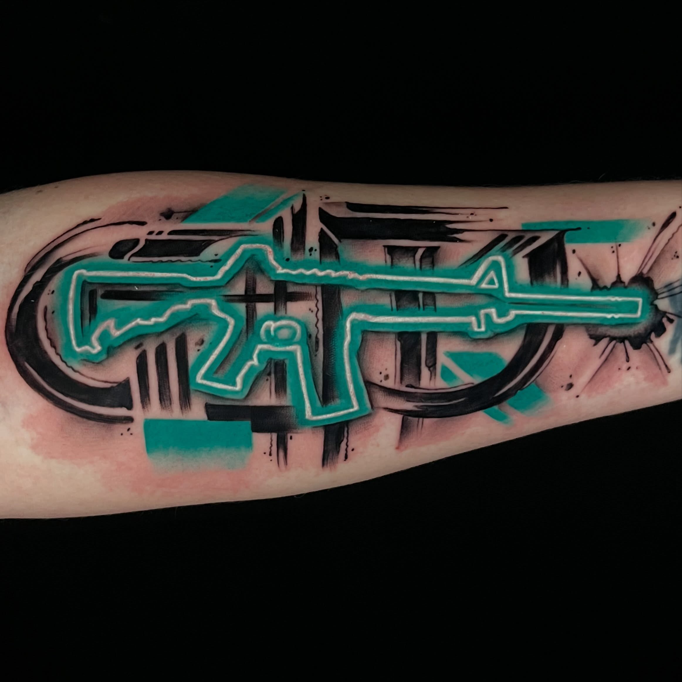 Graffiti-style lettering tattoo on the forearm by Cuda