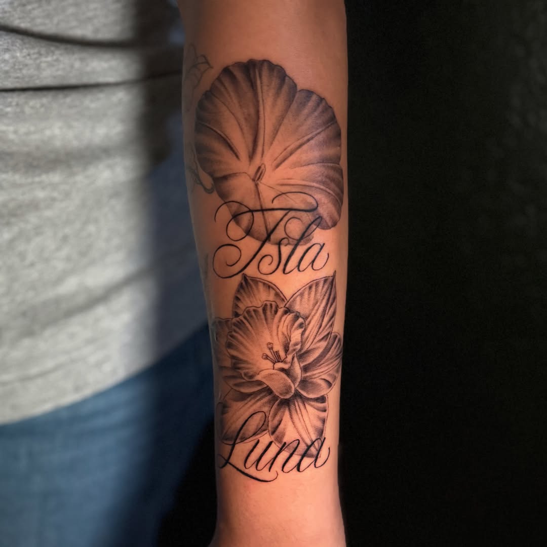 Flower and script realism tattoo on the forearm by Faith Lopez