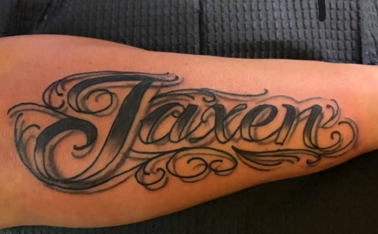 Script lettering lettering script tattoo on the forearm by Shane Watkins