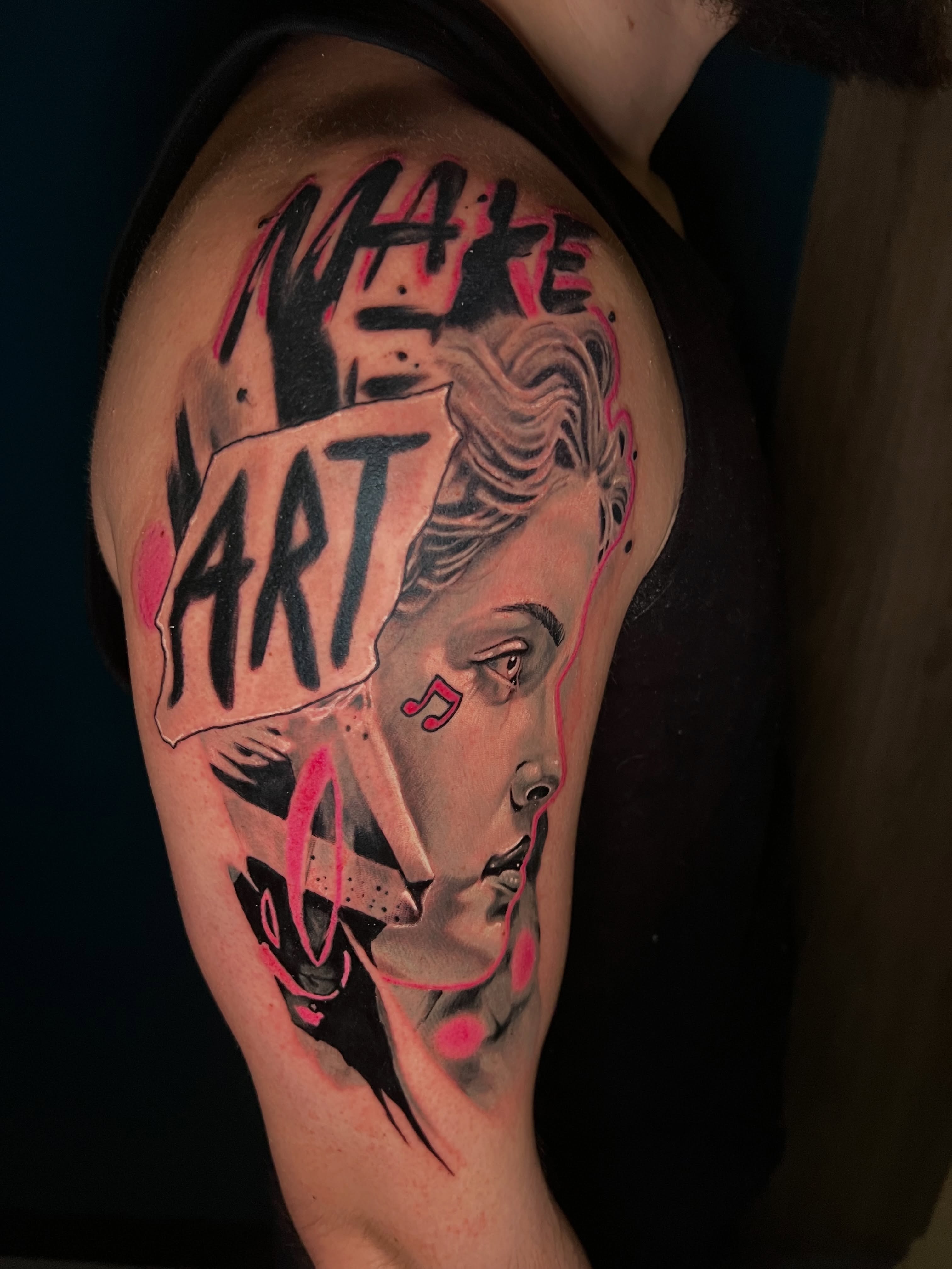 Woman's face with text realism tattoo on the shoulder by Krys King Tattoos