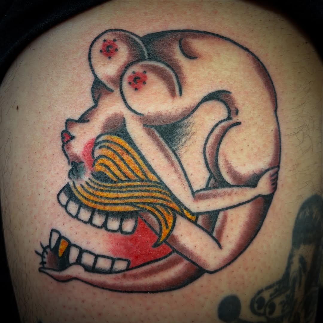 Skull with woman American traditional tattoo on the shoulder by Tattoos Las Vegas,NV