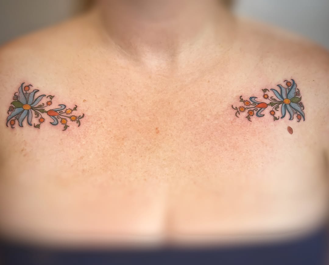 Floral arrangement ornamental tattoo on the chest by Holly