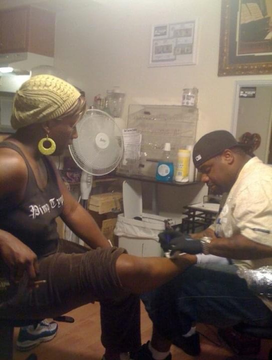 Leg American traditional tattoo on the leg by Christian Goines, Memphis, Tennessee