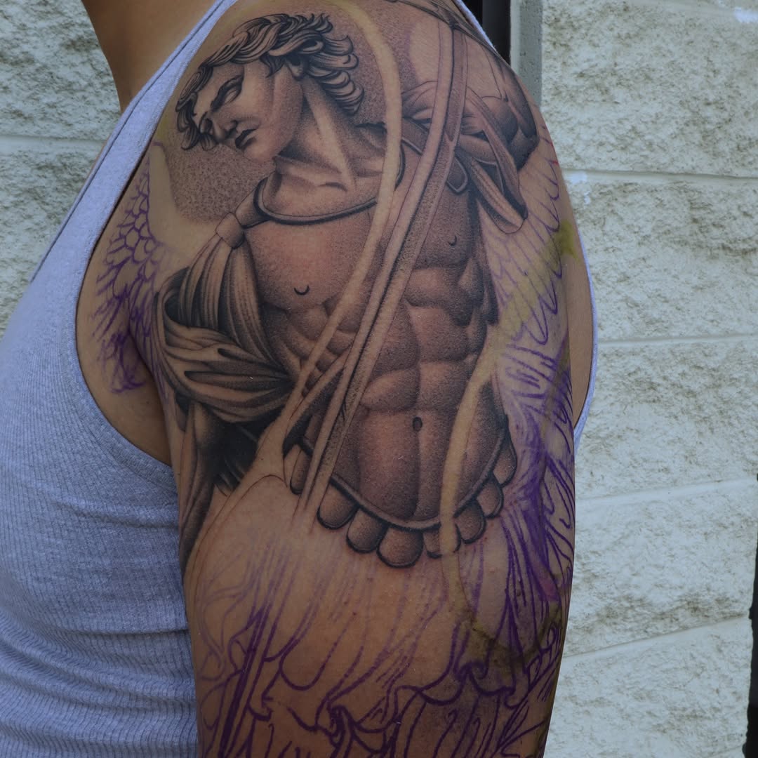 Angelic warrior realism tattoo on the upper arm by San Diego Tattoo Artist