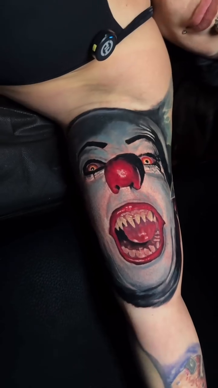 Clown face realism tattoo by Dave James