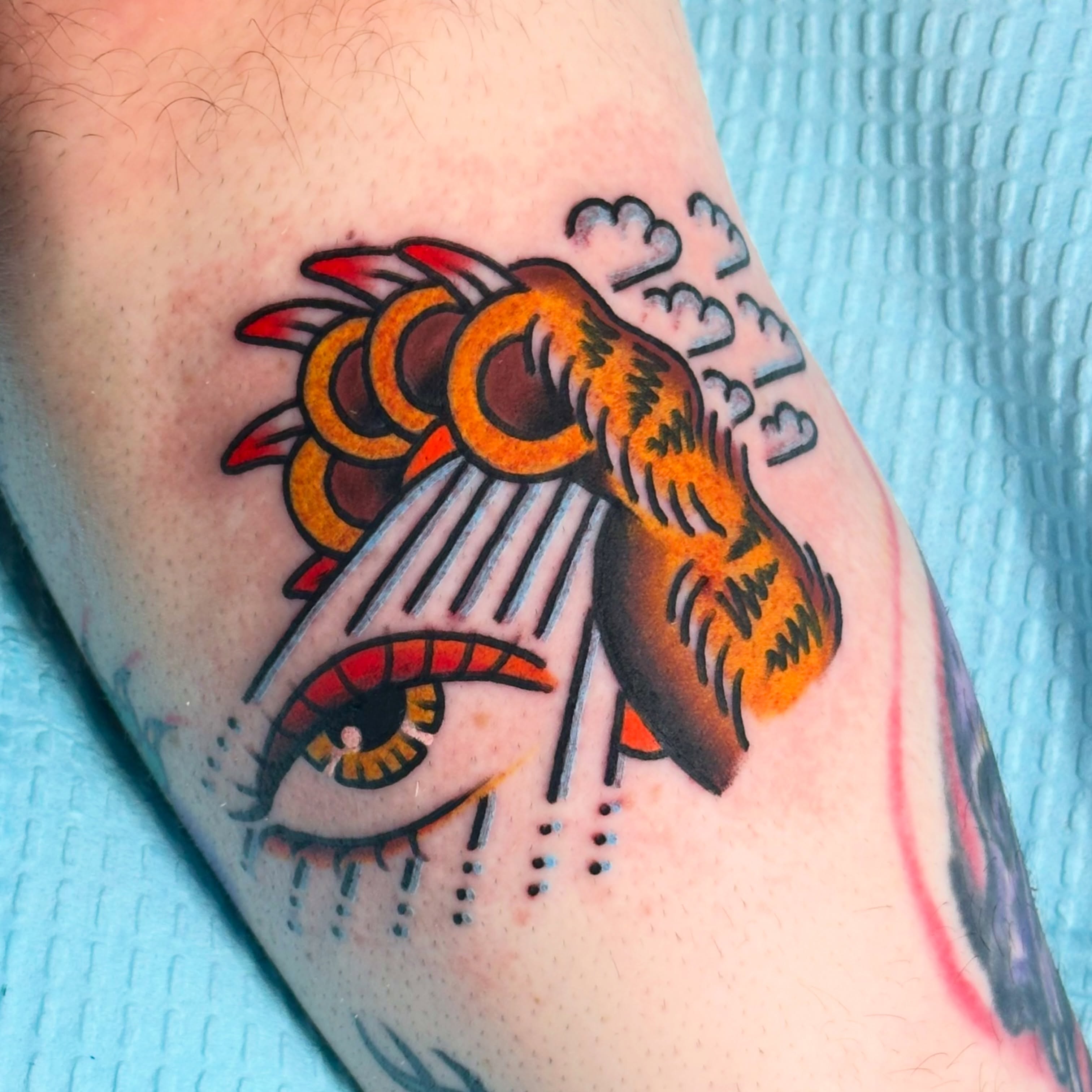 Eye with flame American traditional tattoo on the forearm by Kiki Painmaker Trad Tattooer 🧨