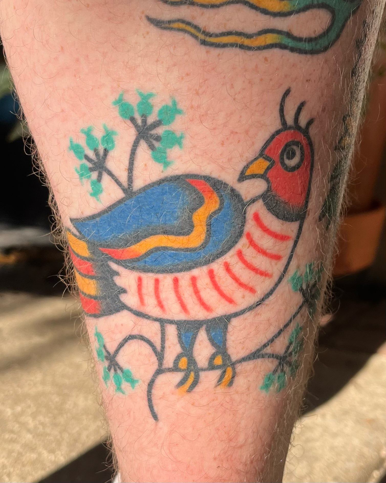 Bird American traditional tattoo on the forearm by Em Adkins